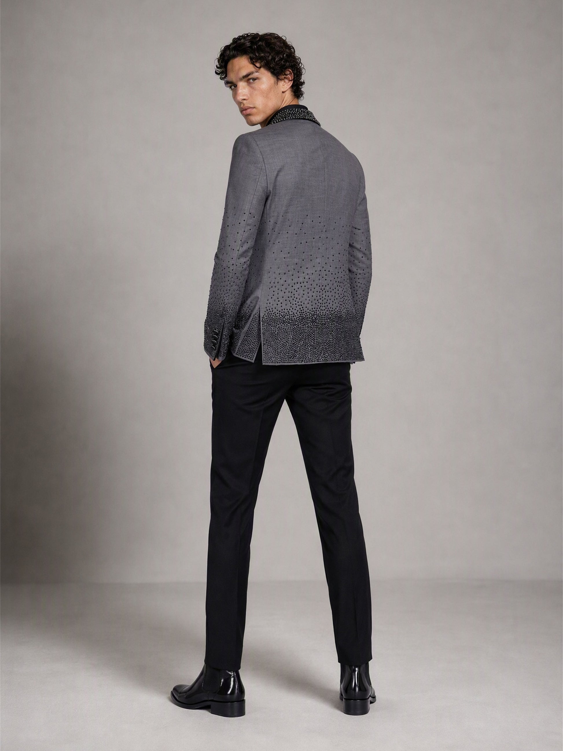 Savile grey rhinestone suit – back view showing inverse gradient rhinestone on hem and cuffs