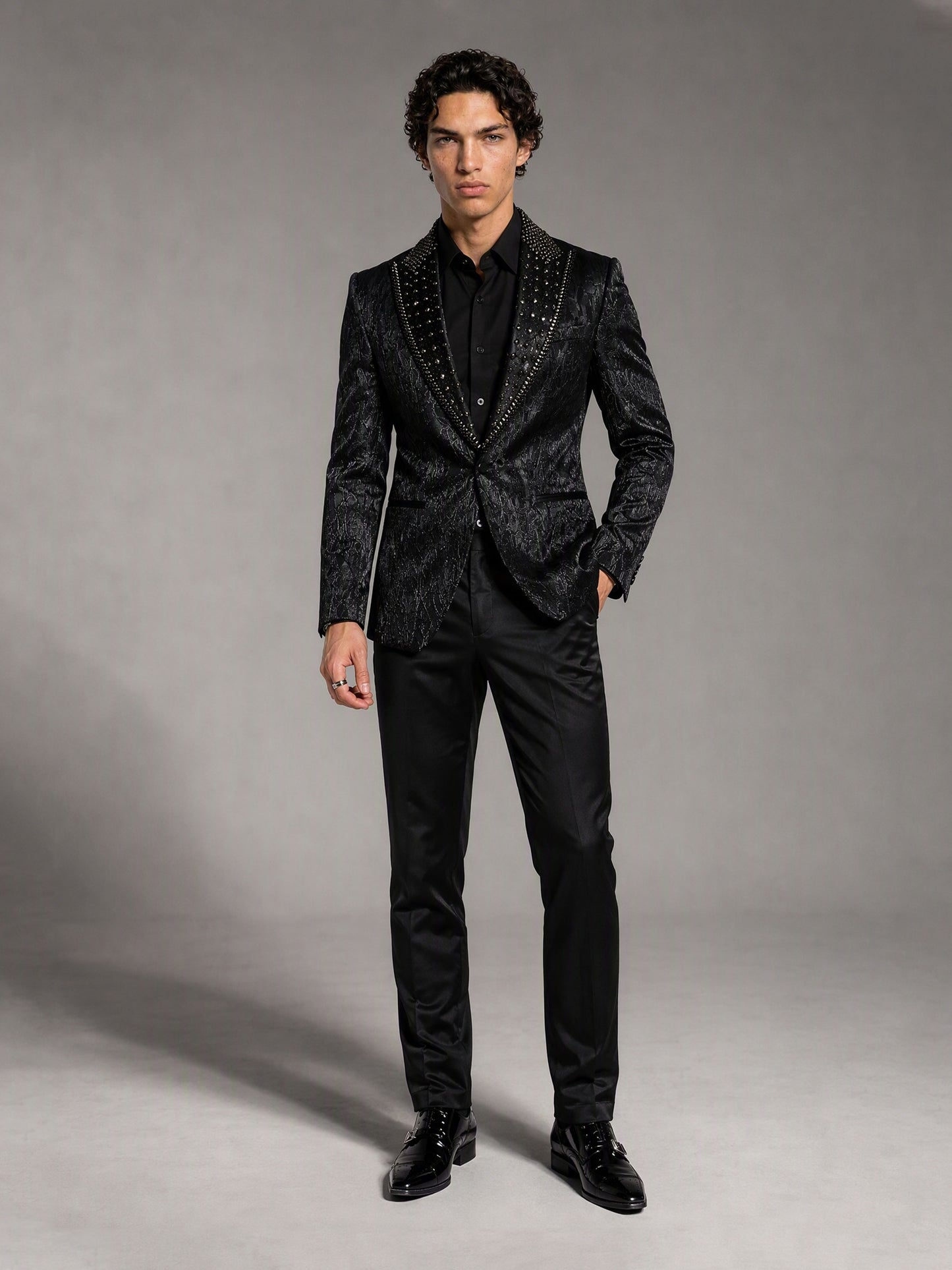 Savile black jacquard rhinestone suit – close-up upper body detail, crystal peak lapels