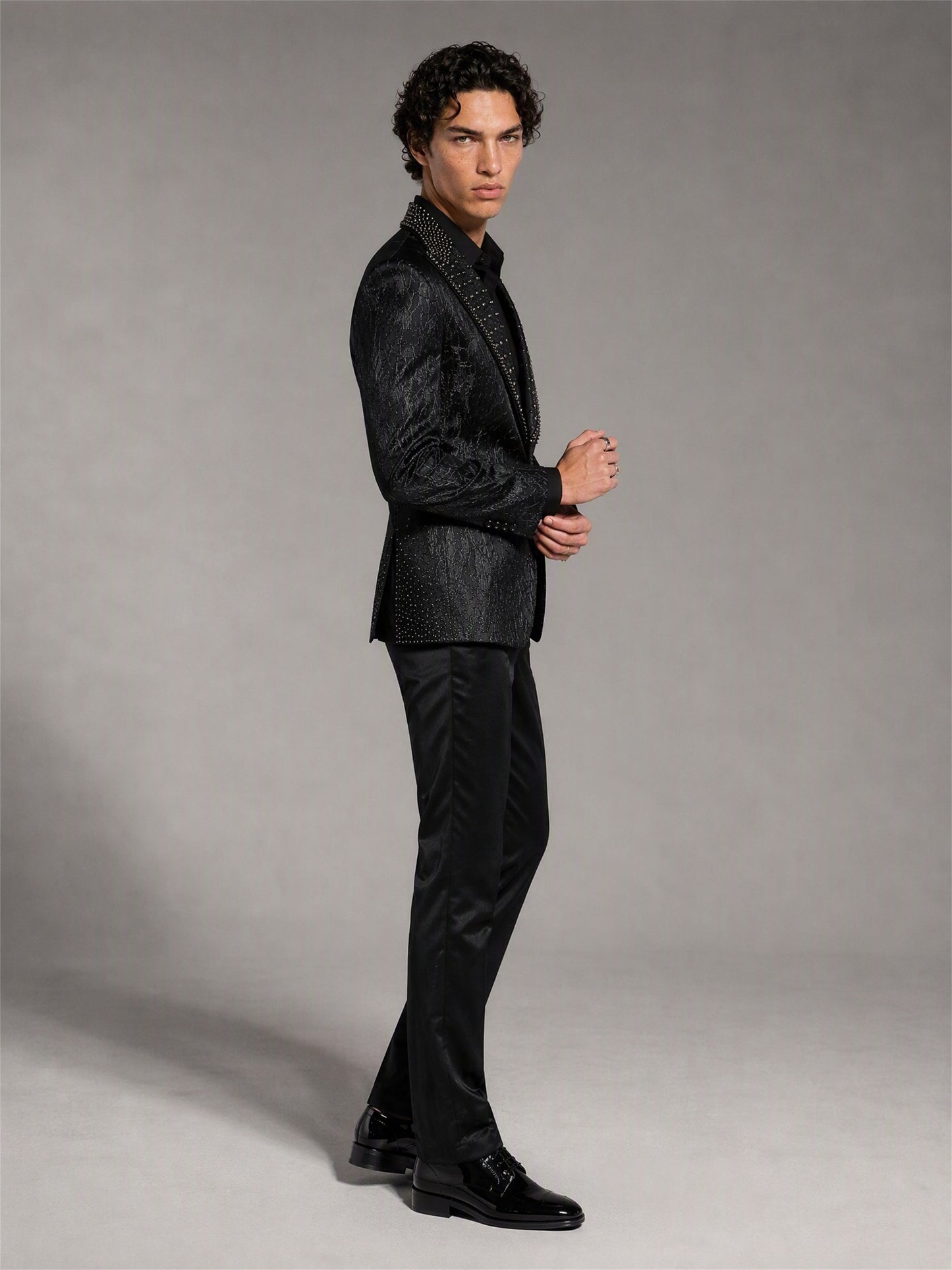 Savile black jacquard rhinestone suit – side profile view showing lapel and silhouette