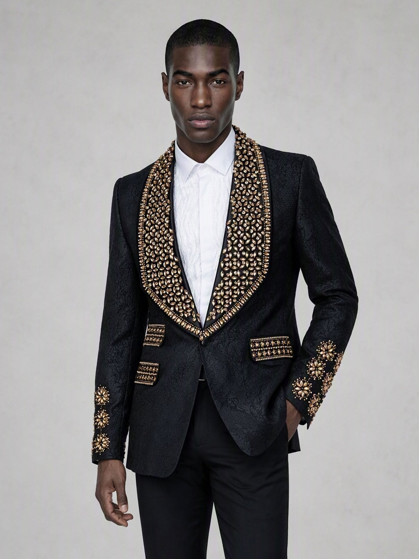 Savile black jacquard gold crystal suit – full-length front view, hand at side showing gold lapel and cuff embroidery