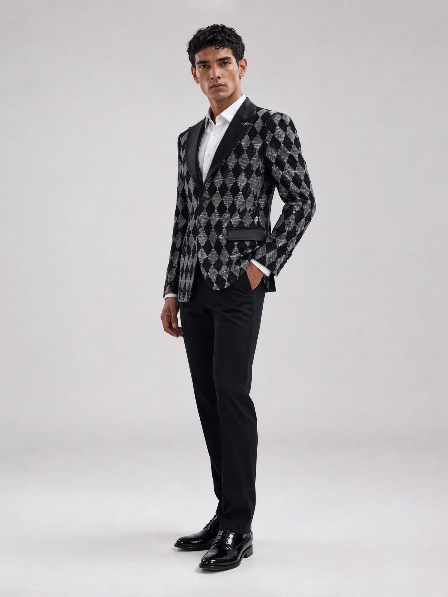 Savile black silver argyle crystal blazer – close-up upper body, silver eagle brooch and satin lapel detail