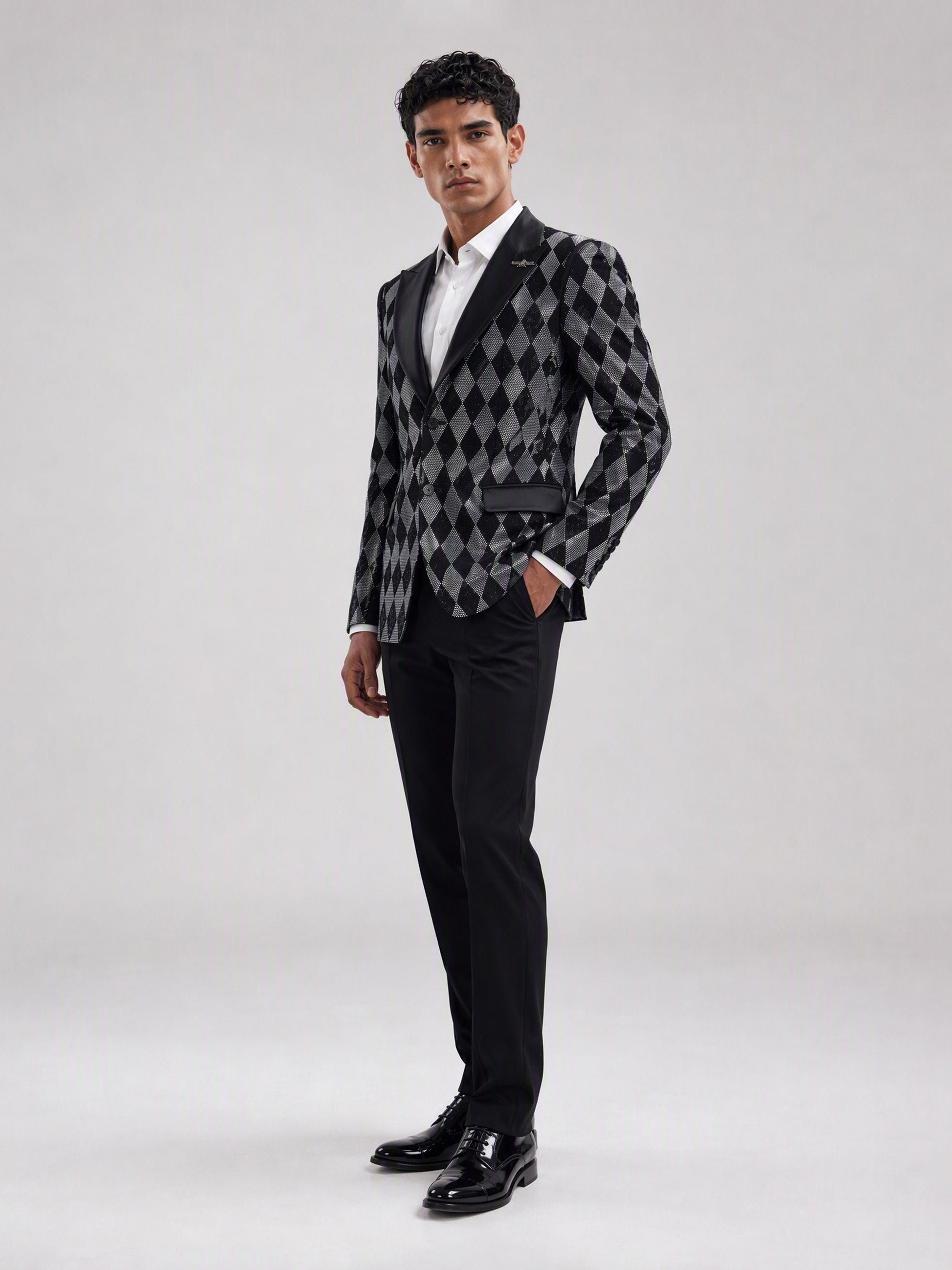 Savile black silver argyle crystal blazer – close-up upper body, silver eagle brooch and satin lapel detail