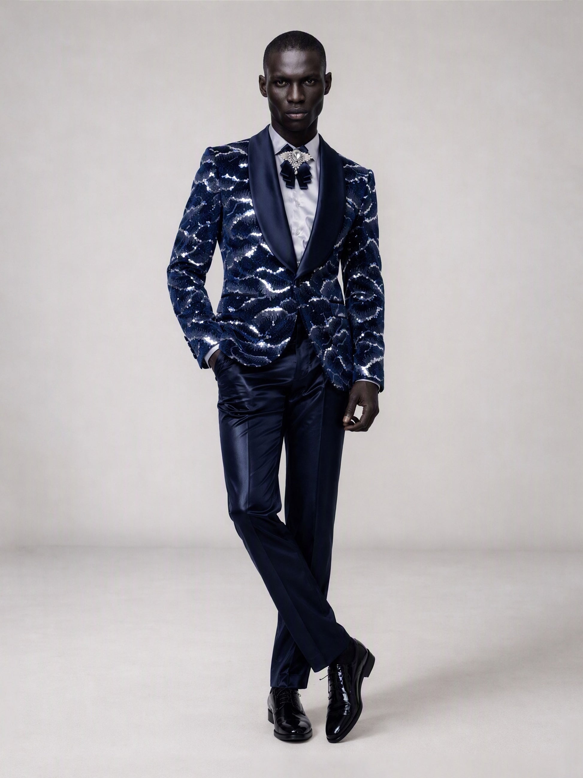 Savile navy blue velvet sequin suit – full-length front view, standing straight showing tuxedo silhouette and navy satin trousers
