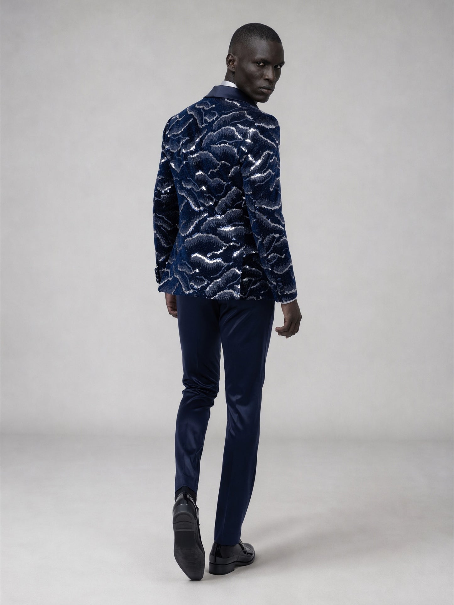 Savile navy blue velvet sequin suit – back view showing all-over silver cloud sequin pattern and satin sleeve trim