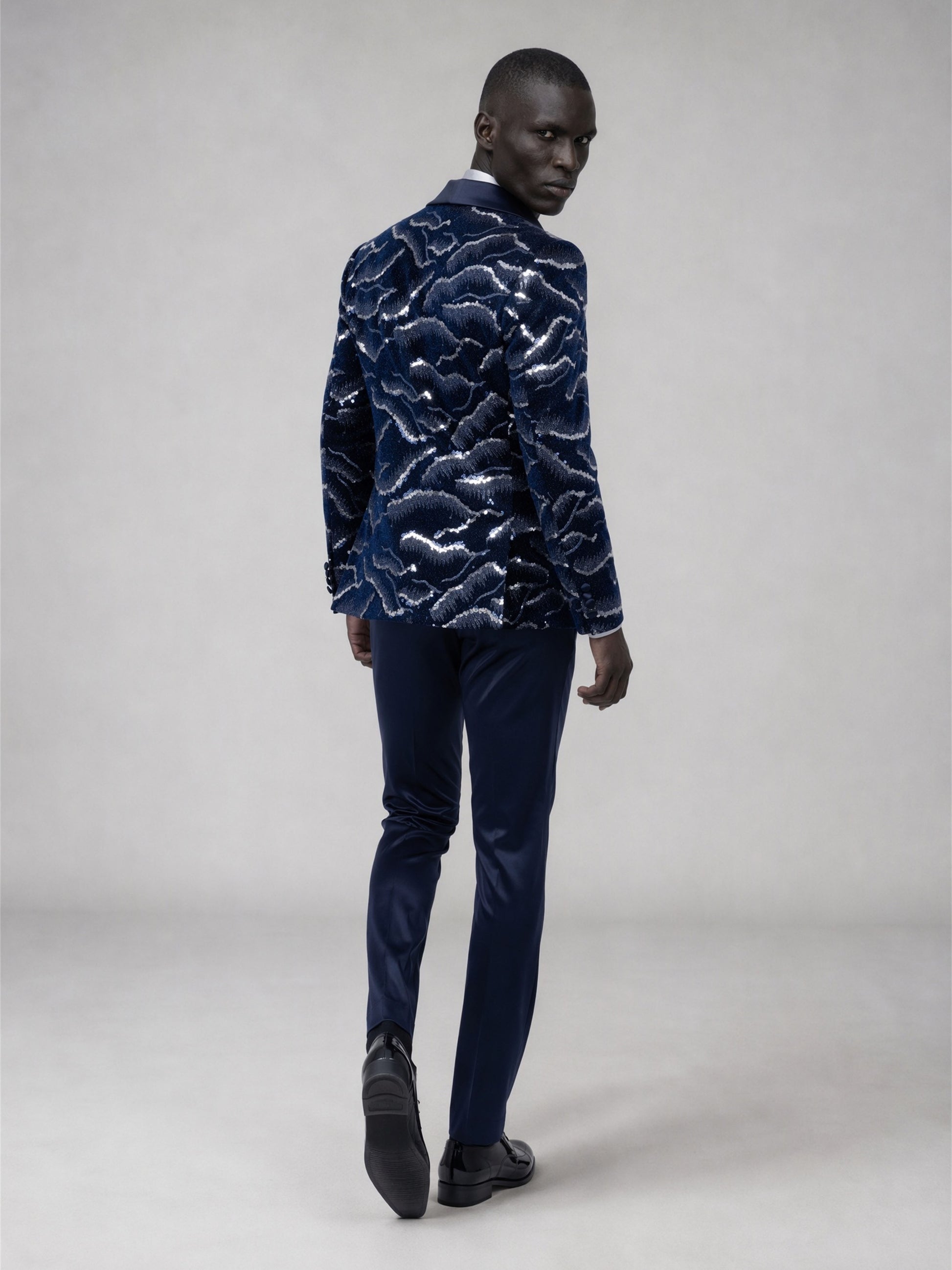 Savile navy blue velvet sequin suit – back view showing all-over silver cloud sequin pattern and satin sleeve trim
