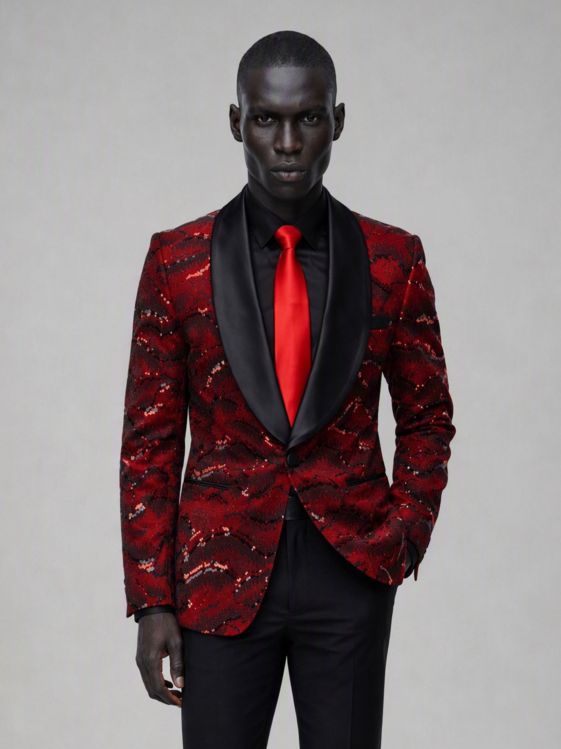Savile red velvet sequin suit – close-up upper body, red cloud sequin embroidery and black satin shawl lapel with red tie detail