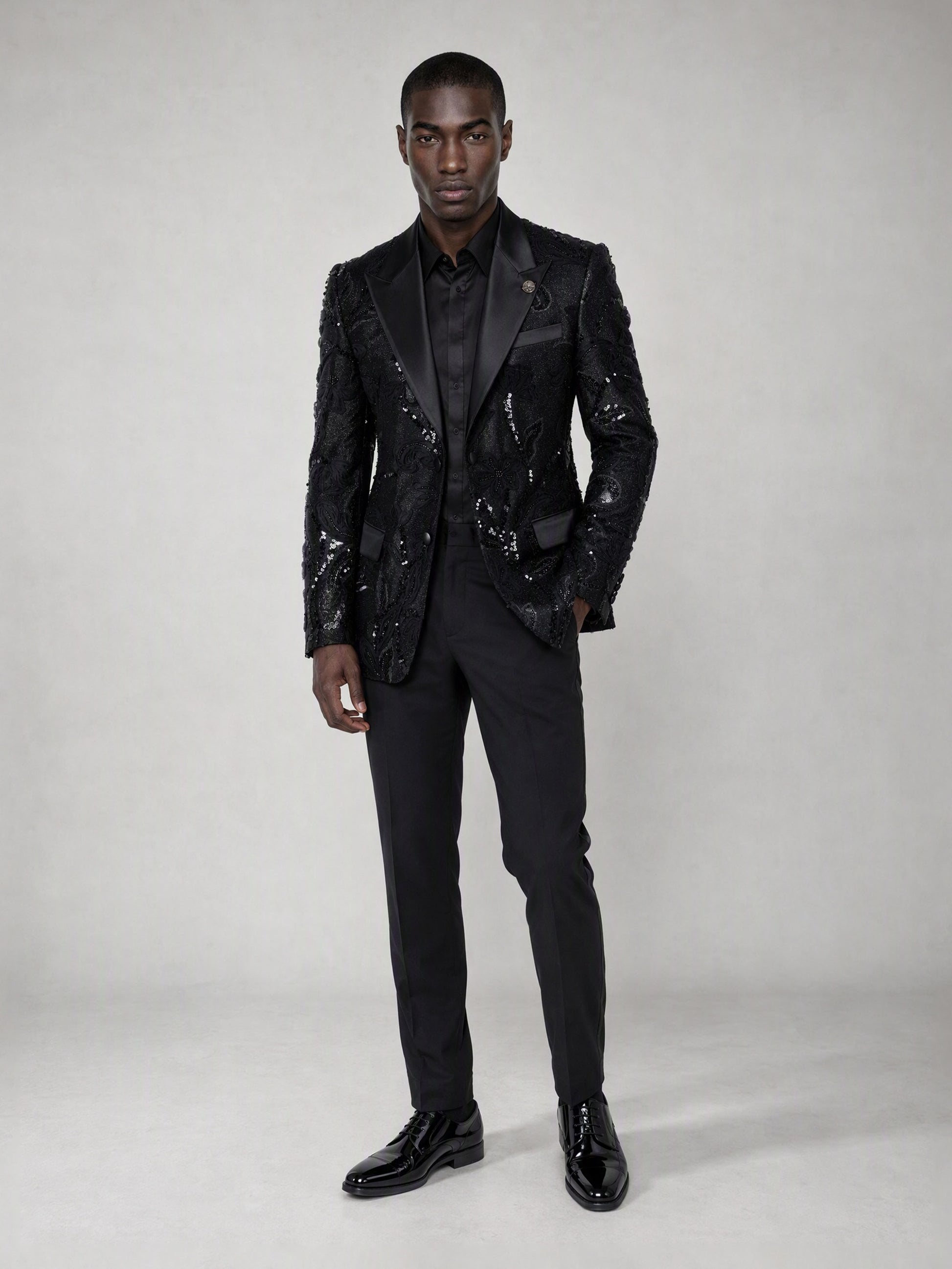 Savile black sequin floral suit – full-length front view, standing straight showing complete floral sequin pattern and black trousers