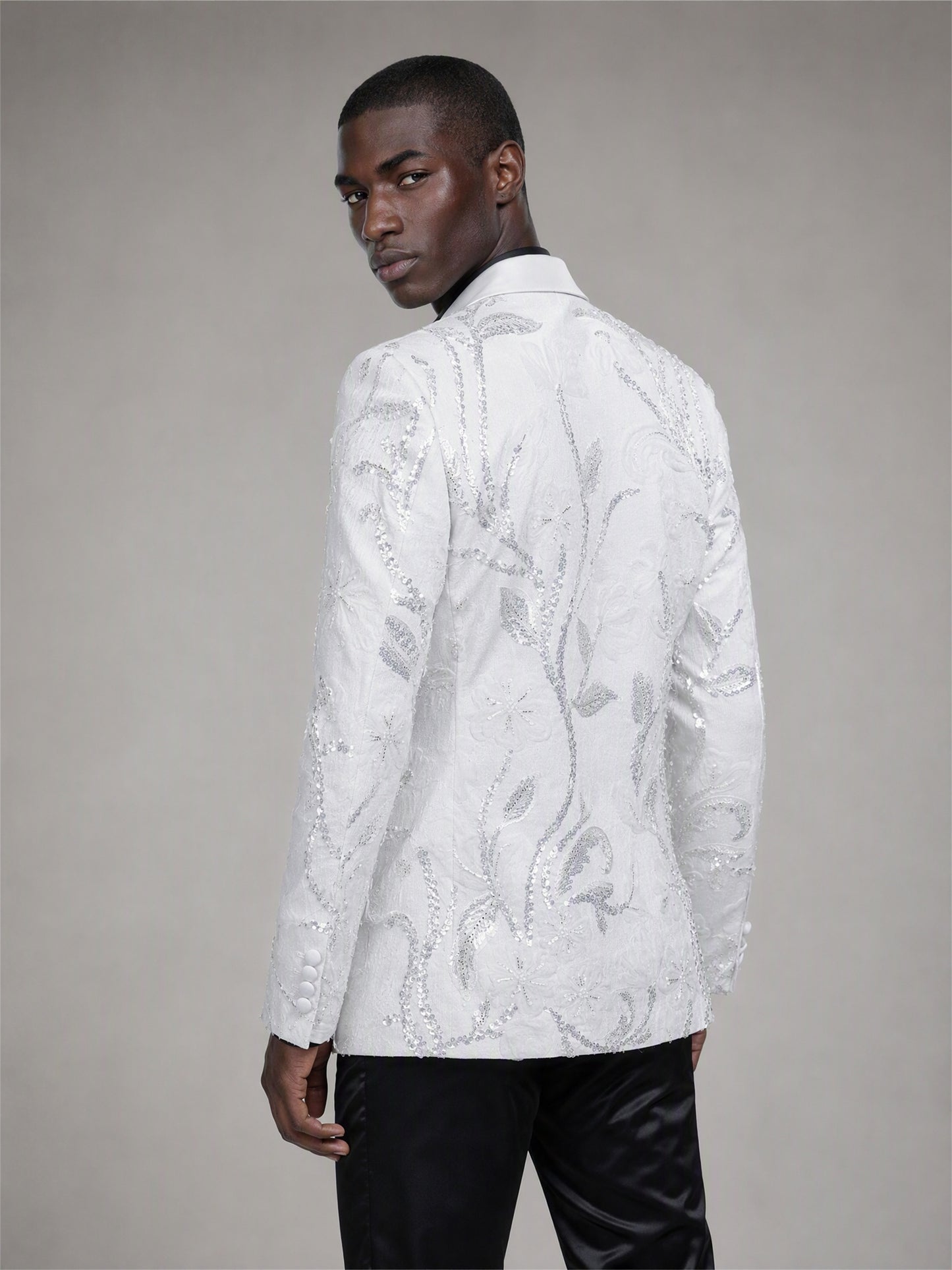 Savile white sequin floral suit – full-length front view, standing straight showing complete floral sequin pattern and black satin trousers