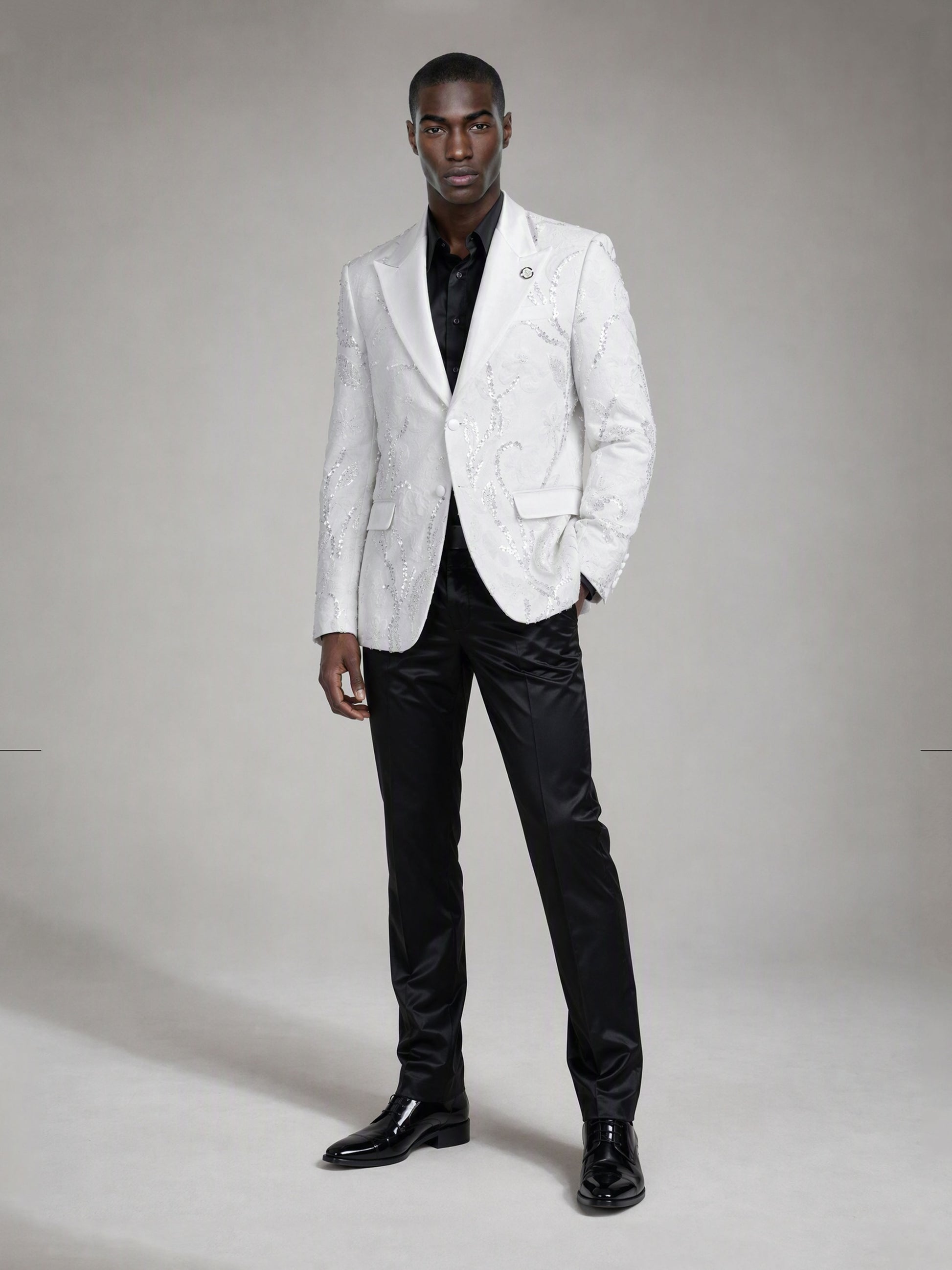 Savile white sequin floral suit – back view showing all-over floral sequin embroidery pattern and center vent