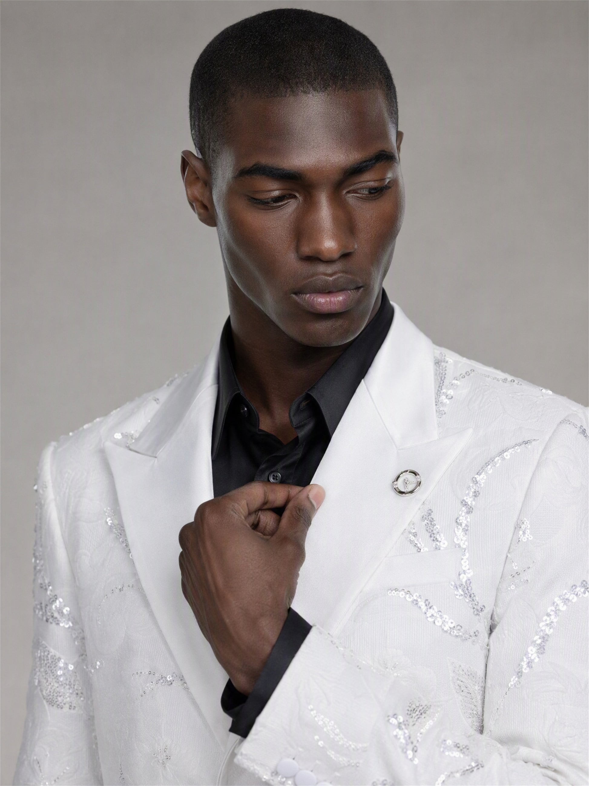 Savile white sequin floral suit – full-length front view, arms at sides showing complete tuxedo silhouette and black patent leather oxfords
