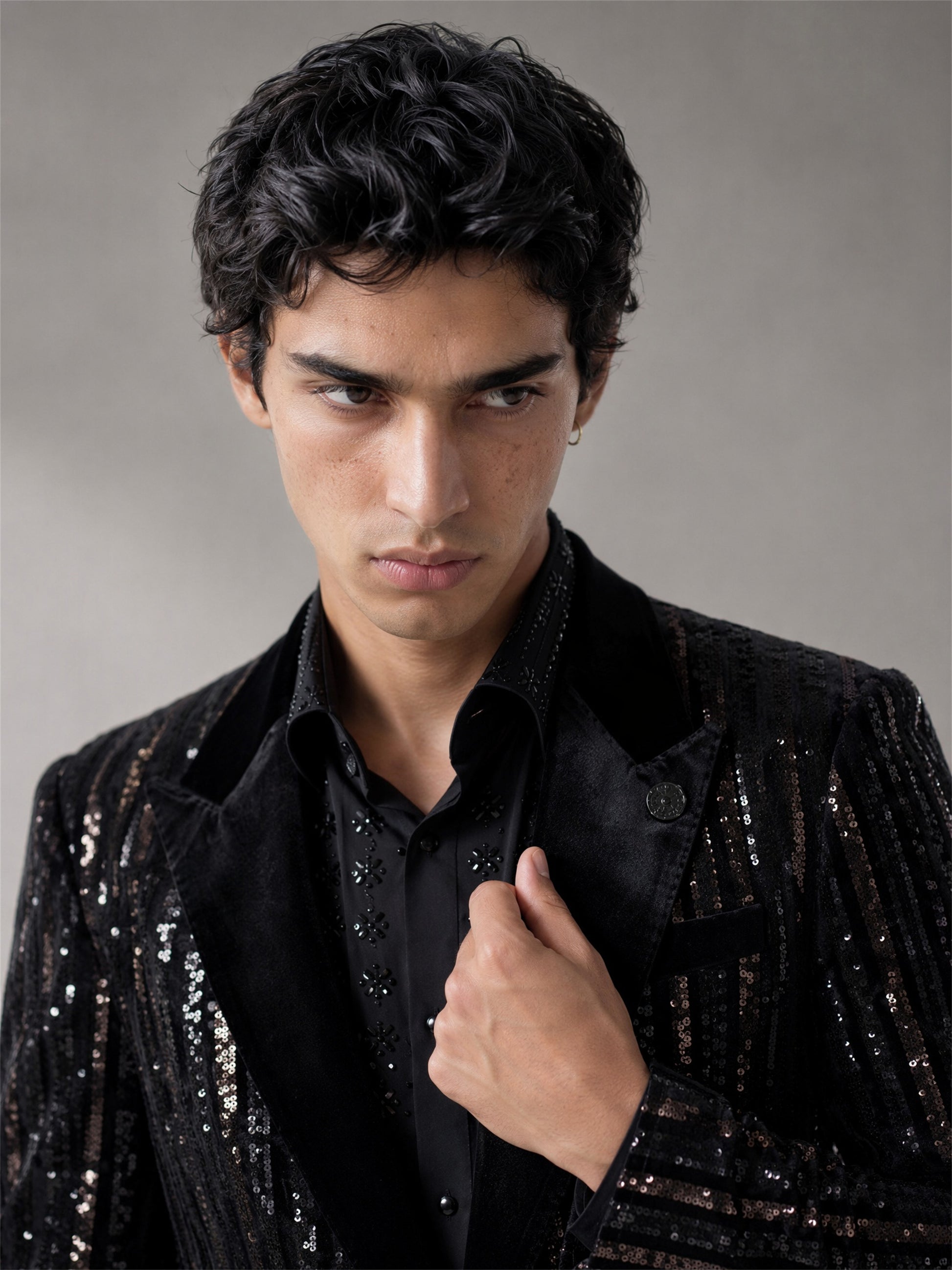 Savile black velvet sequin stripe suit – back view showing full-length silver sequin vertical stripes across back and sleeves