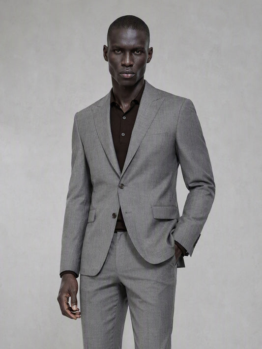 Savile grey wool blend suit – full-length side walking shot showing slim fit profile and black brogue oxfords