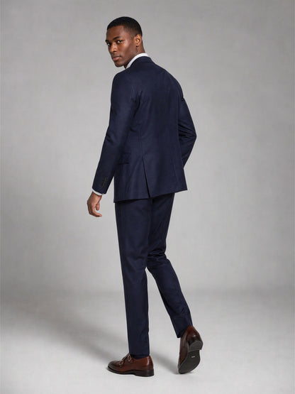 Savile deep navy slim fit suit – close-up upper body front, notch lapels, tonal navy buttons and white pocket square detail