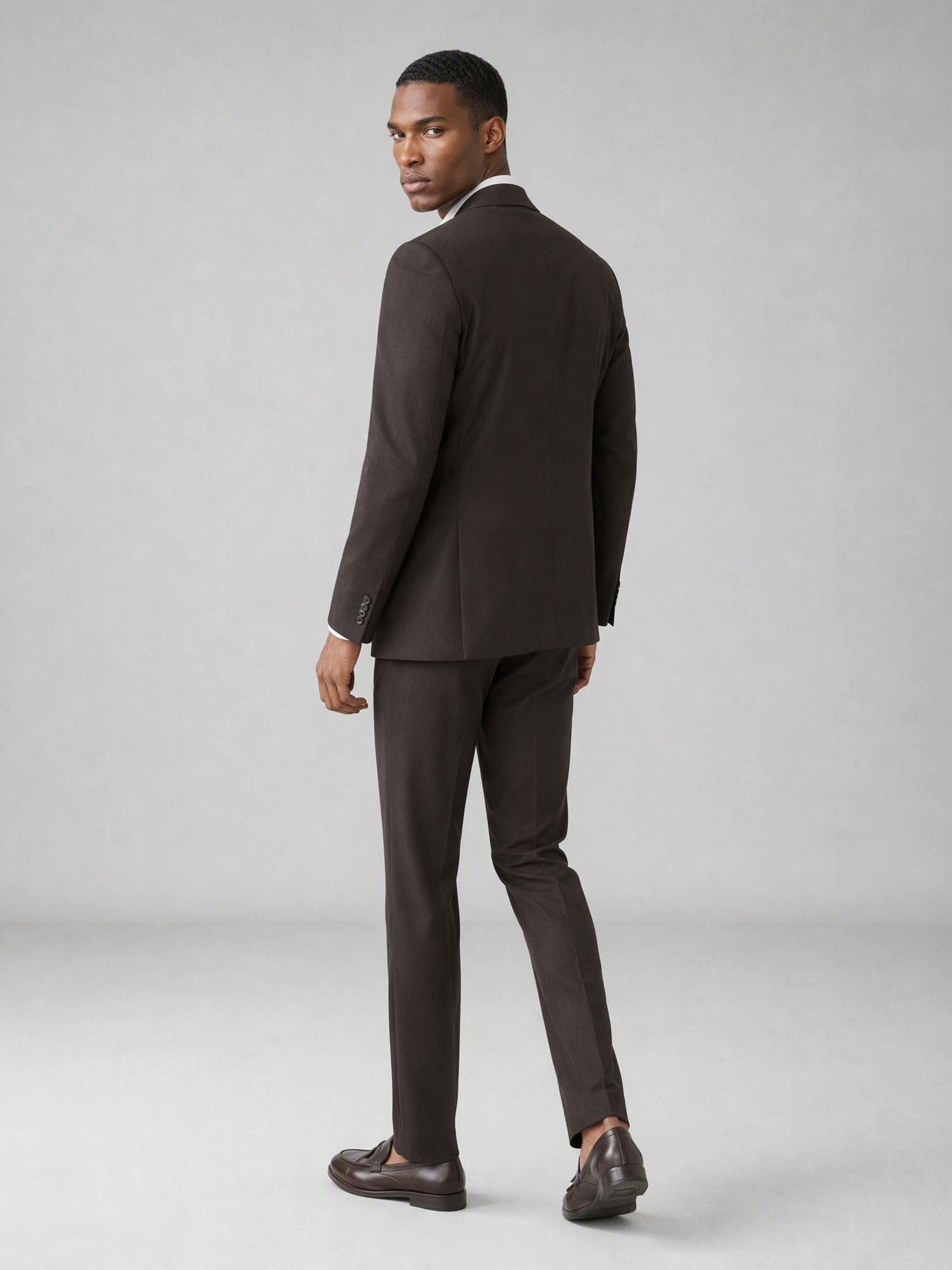 Men's Dark Brown Double-Breasted 3-Piece Suit – Back Walking View