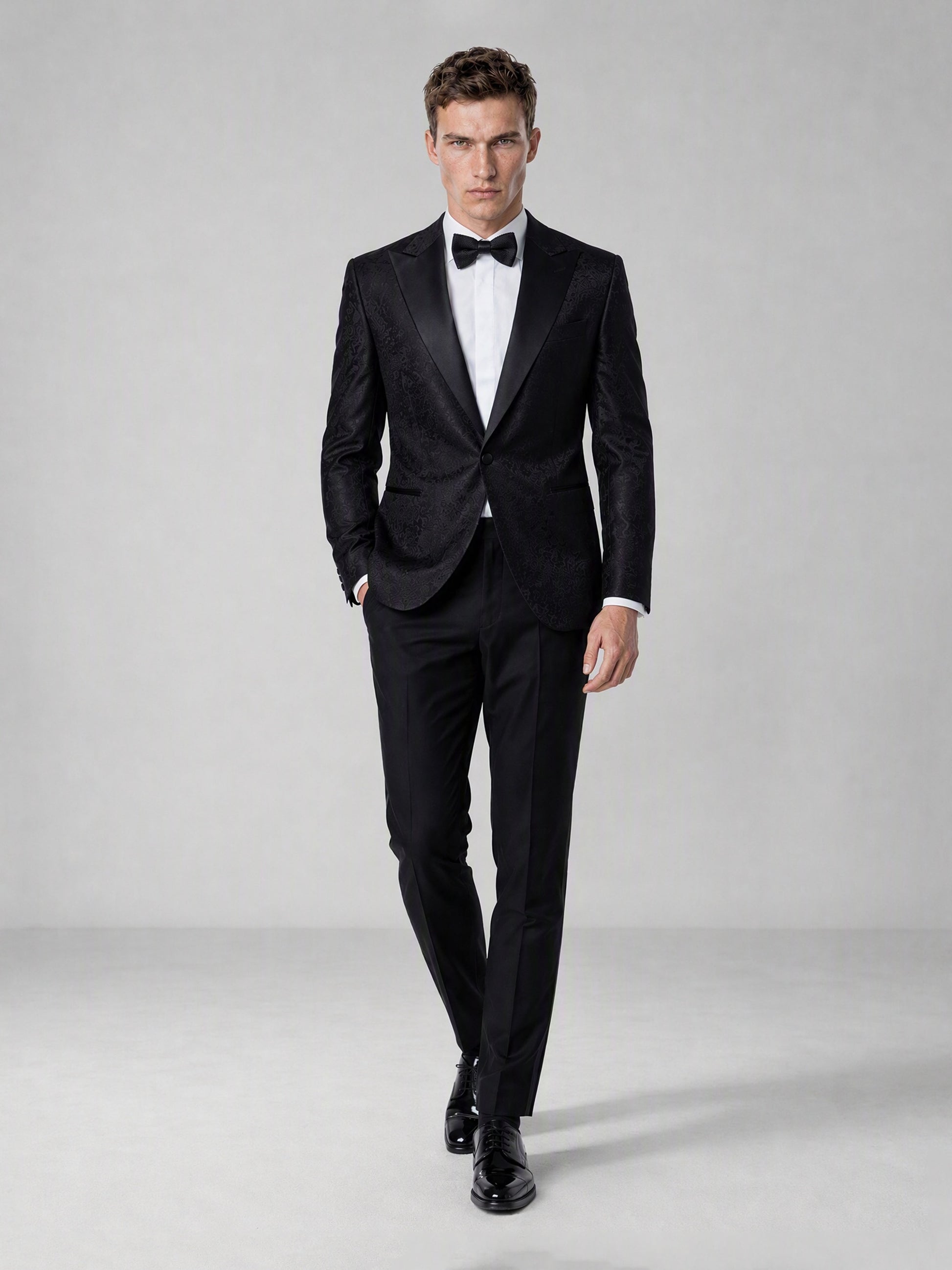 Men's Black Jacquard Peak Lapel Tuxedo Suit – Full Body Front Walking View