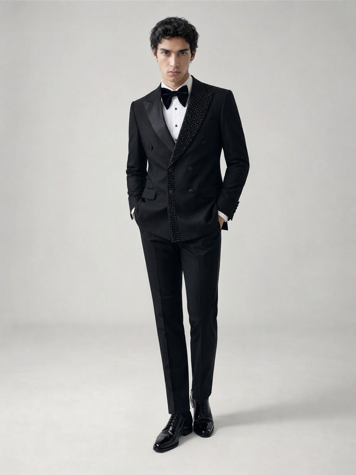 Savile GA0131 black crystal-embellished double-breasted tuxedo jacket - front close-up showing peak lapel and crystal embellishment detail