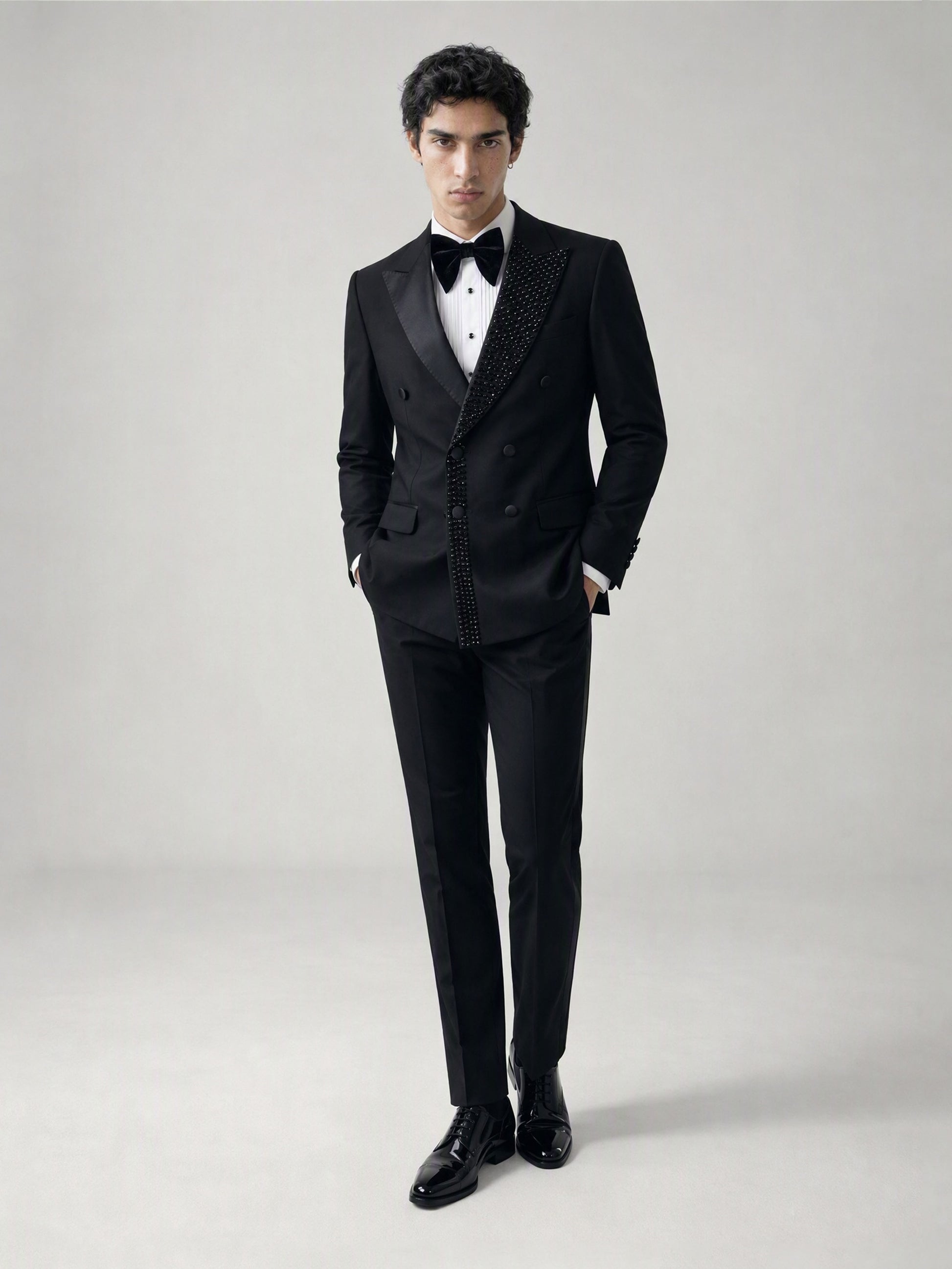 Savile GA0131 black crystal-embellished double-breasted tuxedo jacket - front close-up showing peak lapel and crystal embellishment detail