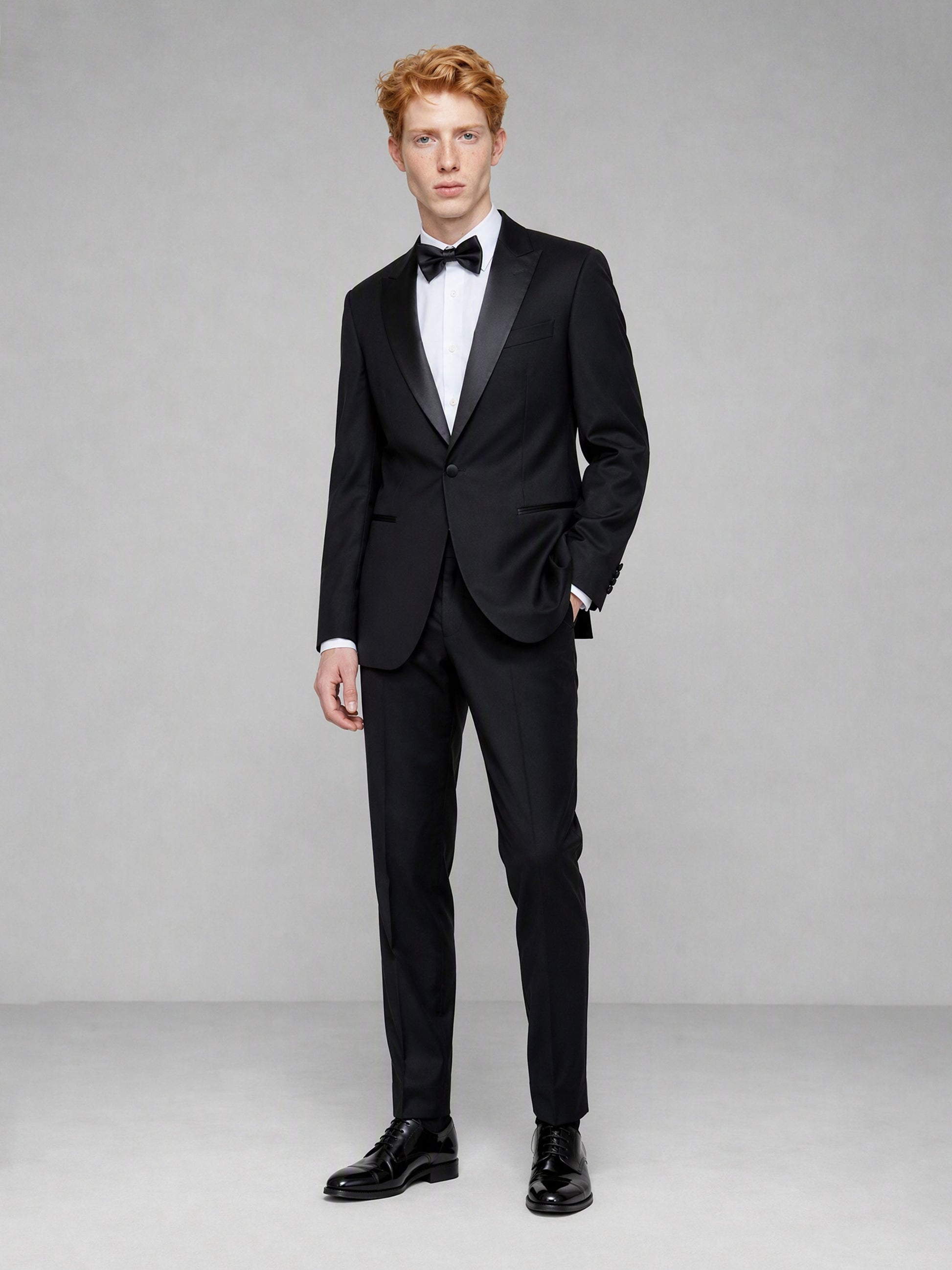 Savile GA0132 black tuxedo suit set - three-quarter front view showing slim tailored fit and satin lapel detail