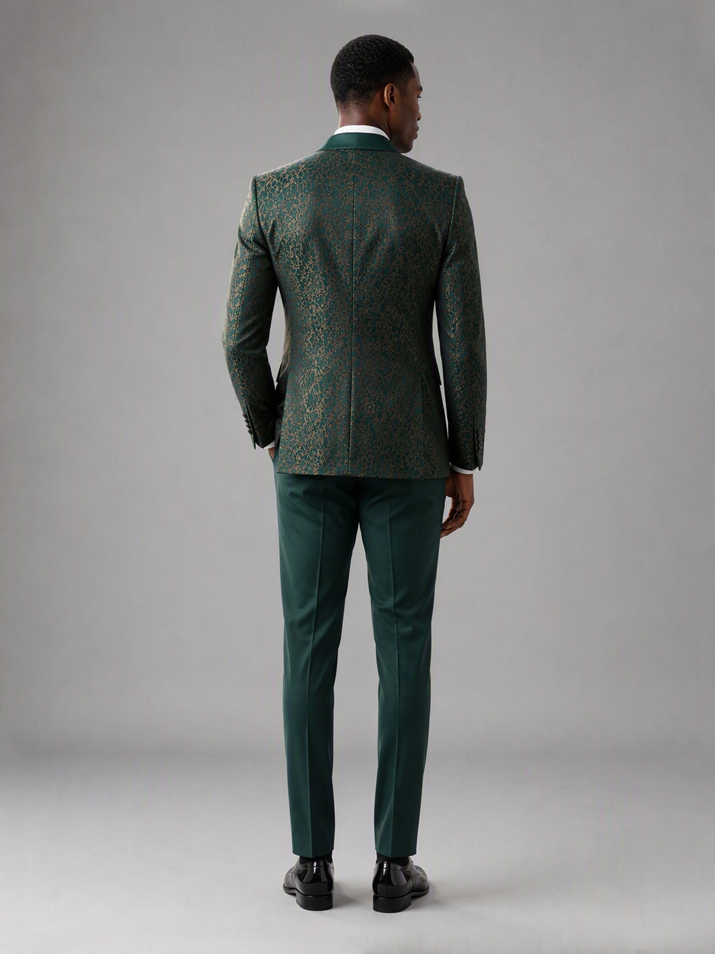 Savile GA0134 green jacquard tuxedo suit - dynamic walking pose showing full 4-piece ensemble and patent Oxford shoes