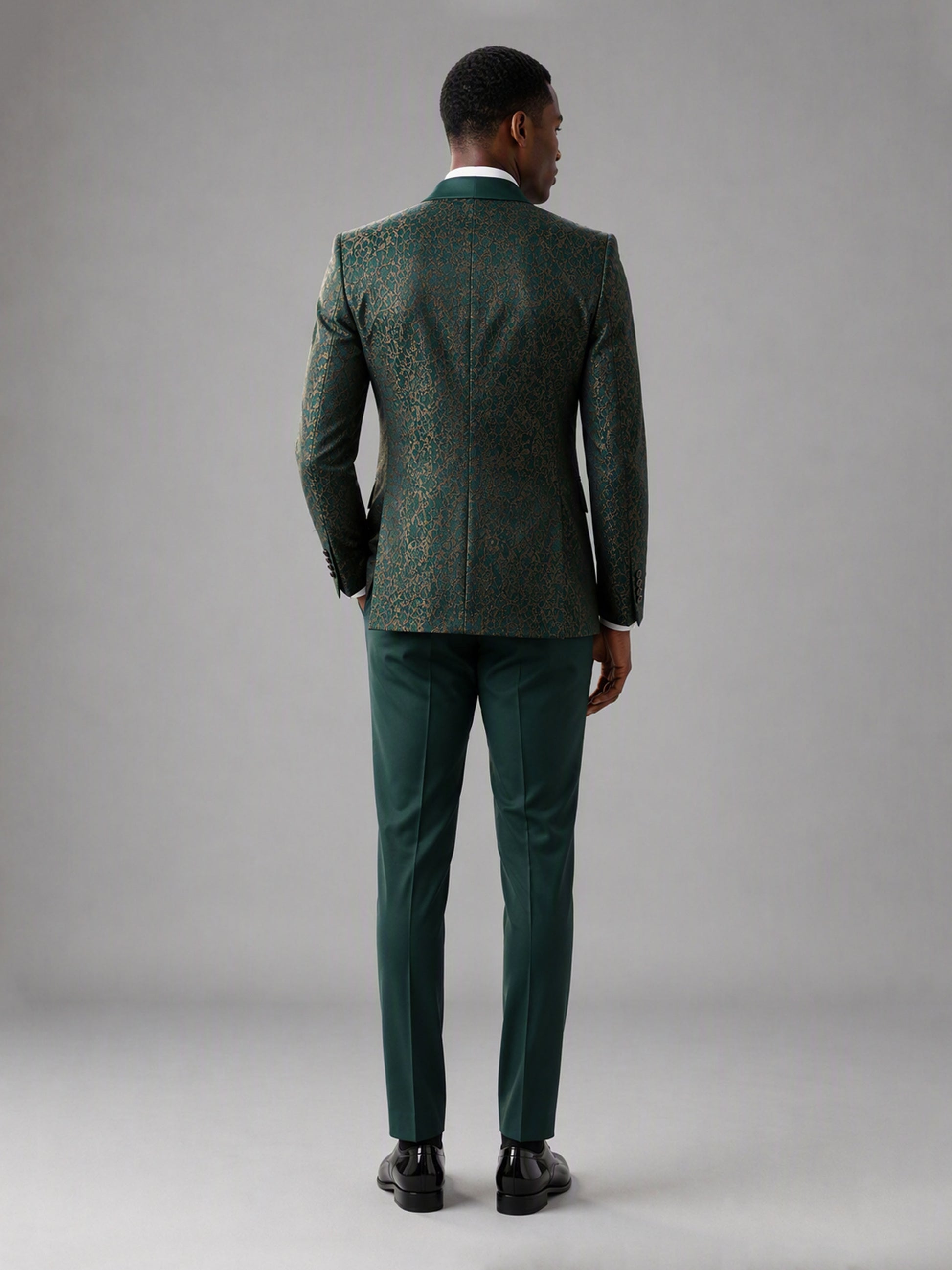 Savile GA0134 green jacquard tuxedo suit - dynamic walking pose showing full 4-piece ensemble and patent Oxford shoes