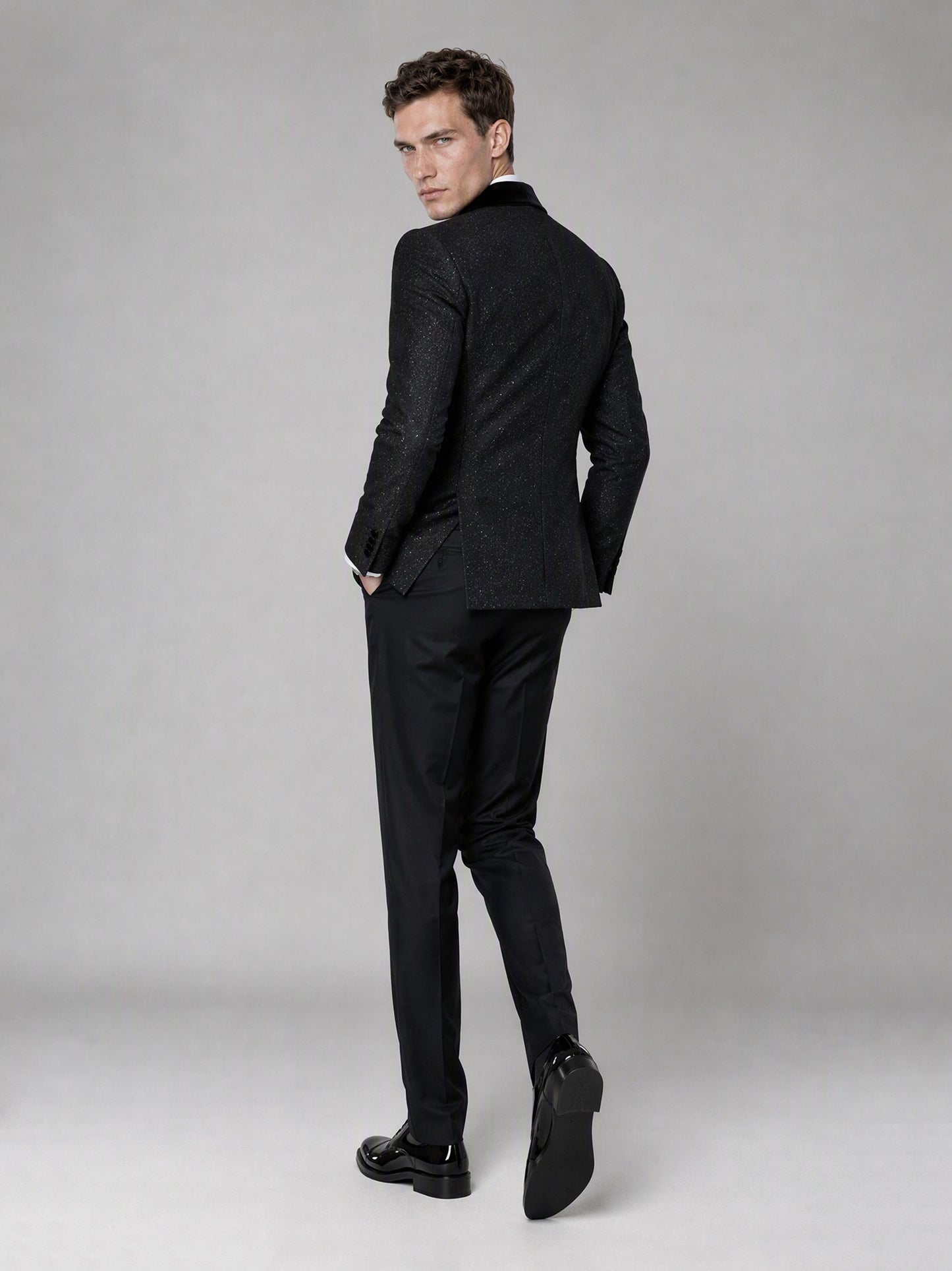 Savile GA0135 black glitter jacquard tuxedo suit - full front view showing double-breasted velvet shawl lapel with bow tie and red pocket square
