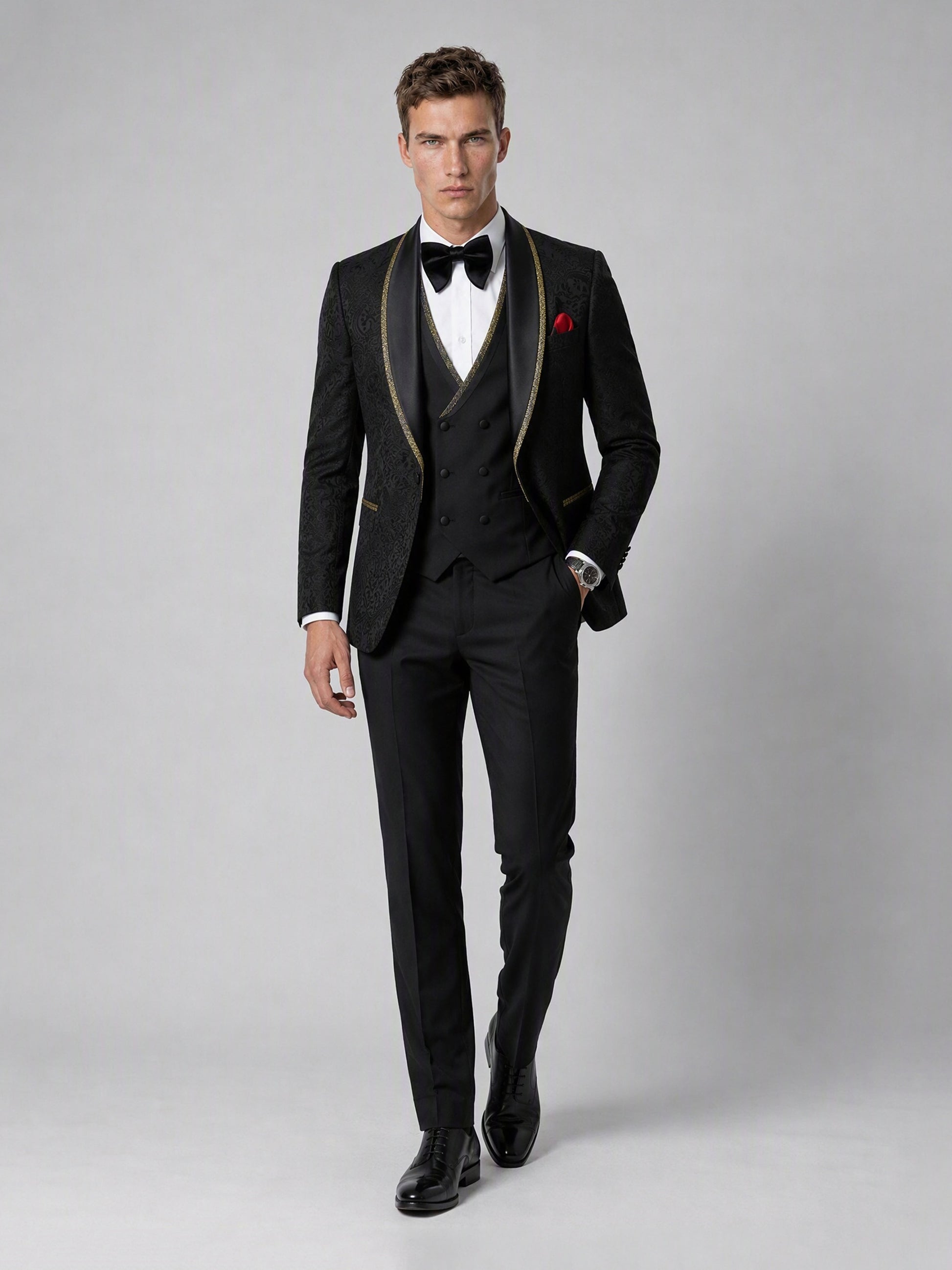 Savile GA0136 black jacquard tuxedo suit - dynamic walking pose showing full 4-piece ensemble with vest layering and patent Oxford shoes