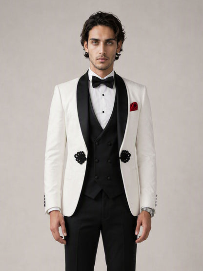 Savile GA0137 ivory jacquard tuxedo suit - upper body close-up showing black velvet shawl lapel, sequin floral appliqué and red pocket square detail