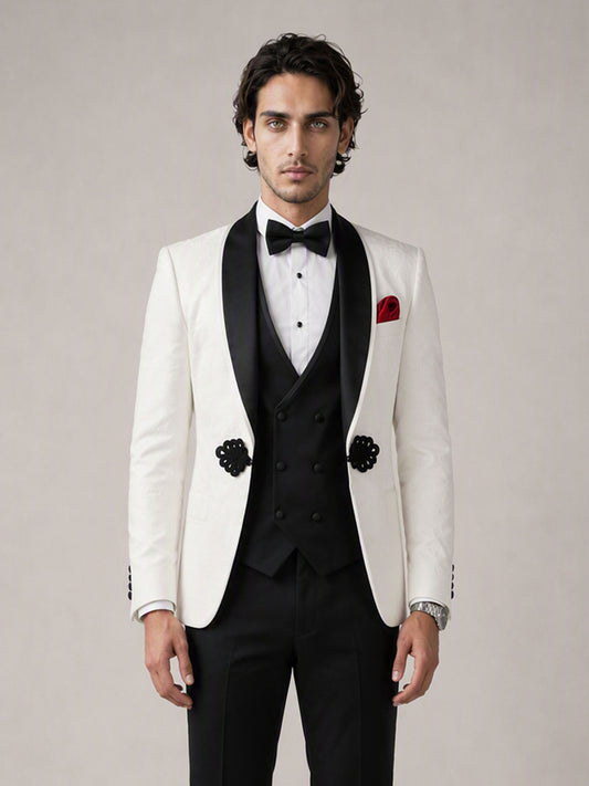Savile GA0137 ivory jacquard tuxedo suit - upper body close-up showing black velvet shawl lapel, sequin floral appliqué and red pocket square detail
