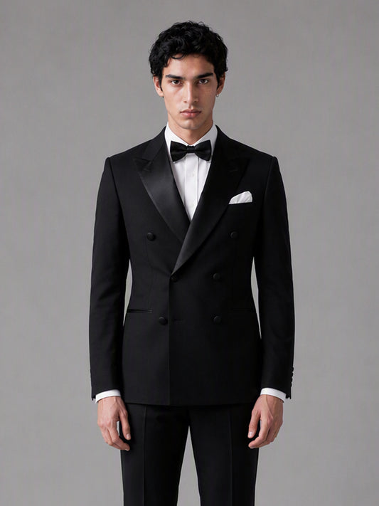 Savile GA0139 black tuxedo suit - upper body close-up showing sharp satin peak lapel and double-breasted button detail