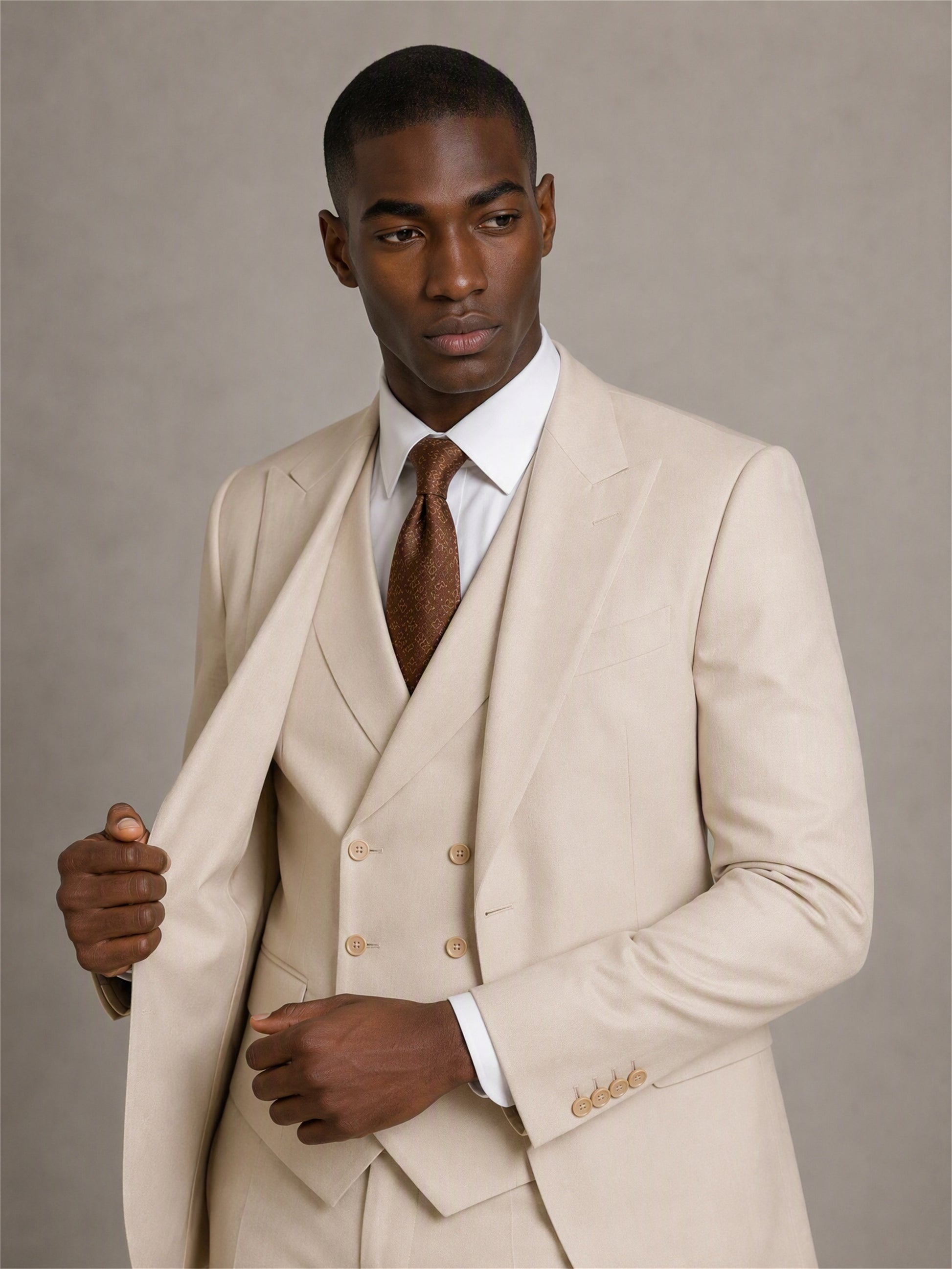 Savile GA0140 beige suit set - rear three-quarter walking view showing clean back construction and slim trouser cut