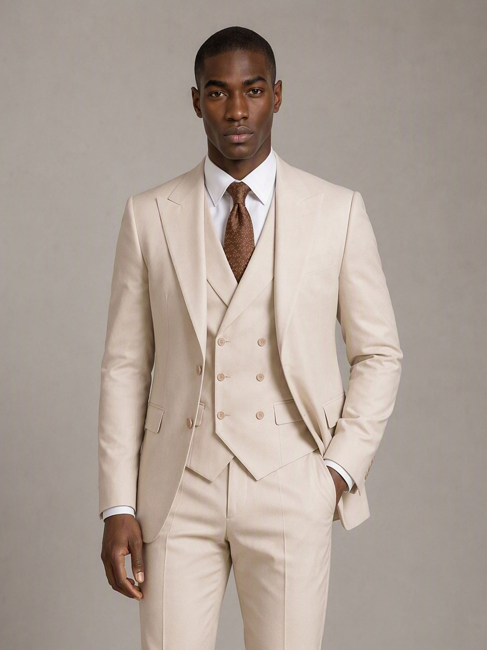Savile GA0140 beige suit - upper body close-up showing sharp peak lapel, double-breasted vest buttons and brown silk tie detail