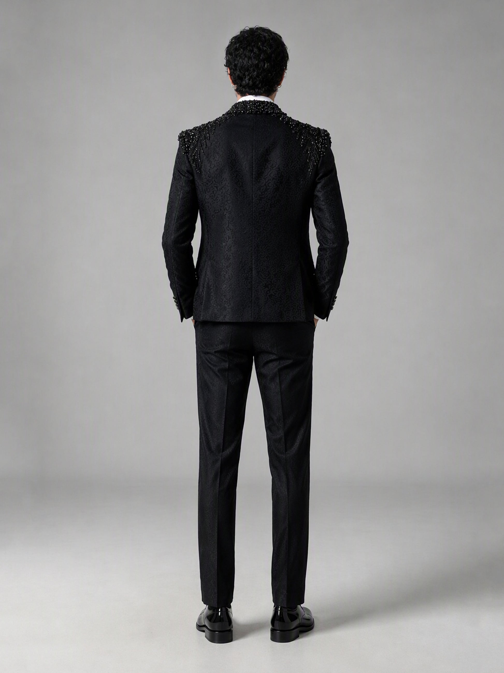 Savile GA0141 black tuxedo suit - three-quarter front view showing crystal shoulder detail, single-breasted vest and slim tailored fit
