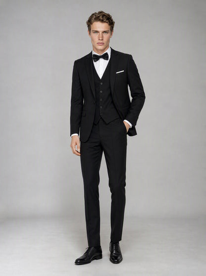 Savile GA0142 black suit - three-quarter side view showing peak lapel, single-breasted vest and French cuff detail