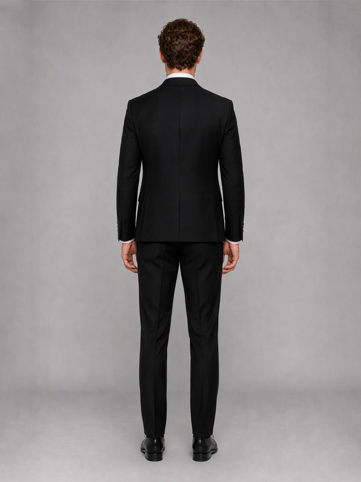 Savile GA0142 black suit set - relaxed full-length front view showing slim tailored fit and vest layering with black Oxford shoes