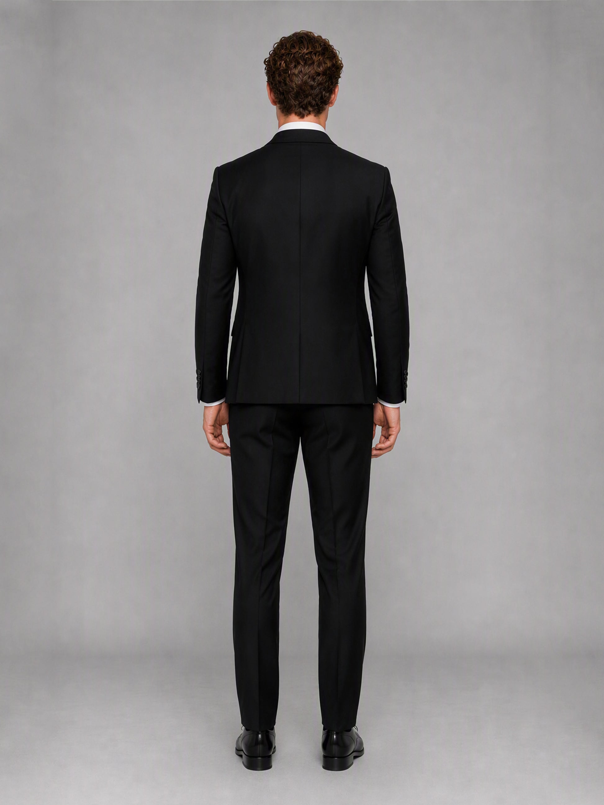Savile GA0142 black suit set - relaxed full-length front view showing slim tailored fit and vest layering with black Oxford shoes