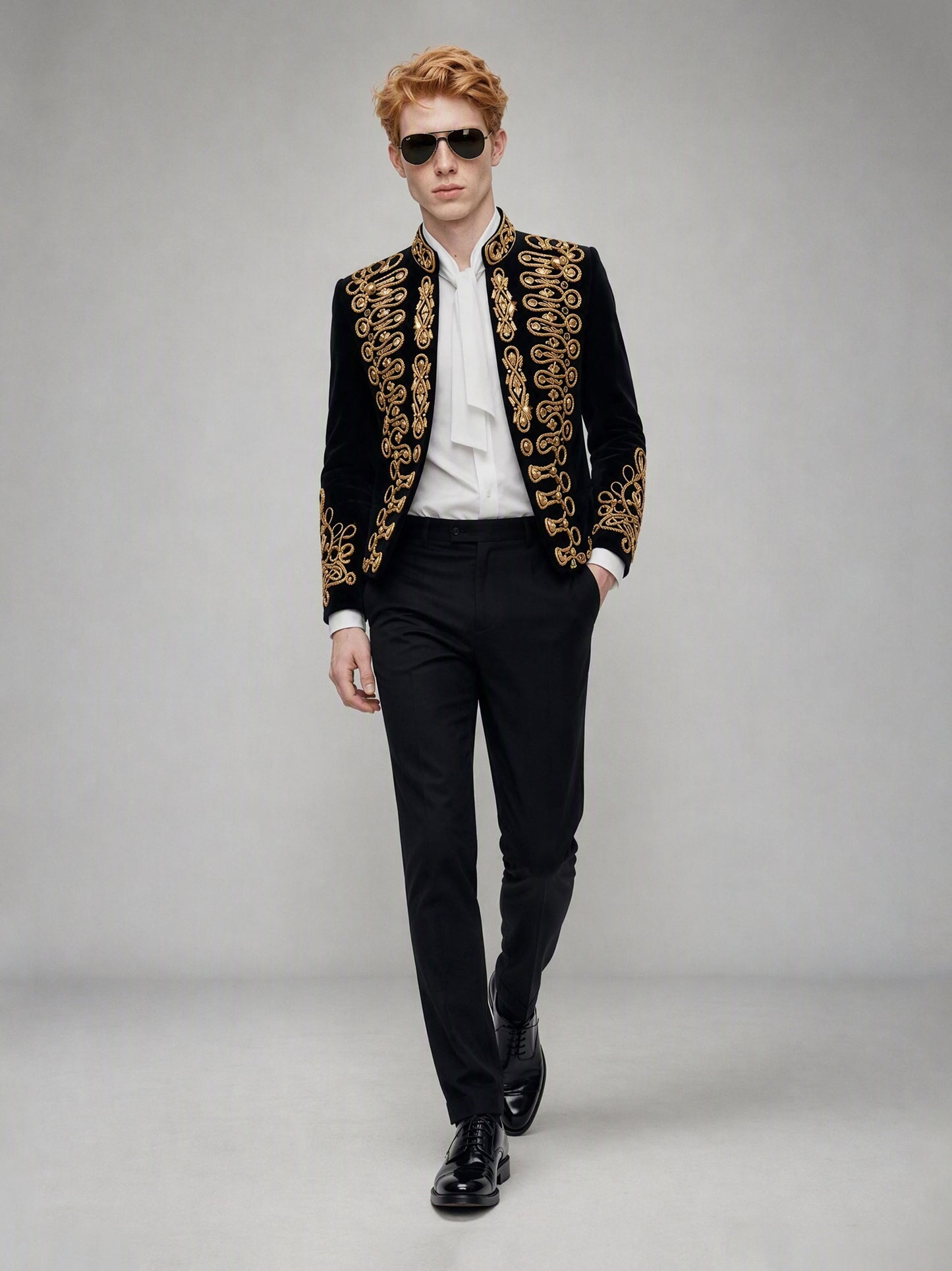Savile GA0143 black velvet gold embroidered suit - dynamic walking pose showing full silhouette and embroidery detail with patent Oxford shoes
