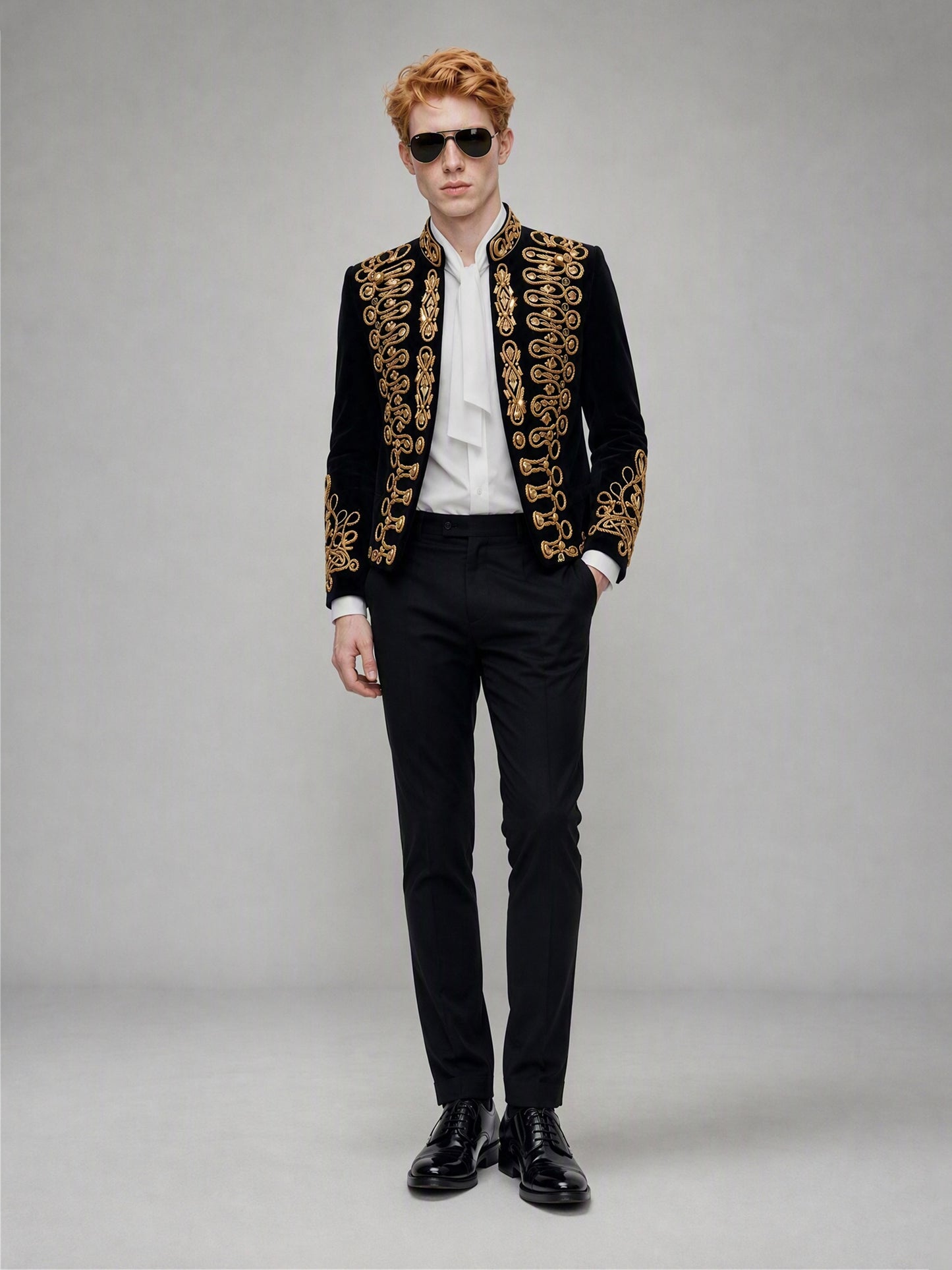 Savile GA0143 black velvet military suit - three-quarter front walking view showing gold embroidery on front panels, cuffs and slim trouser fit