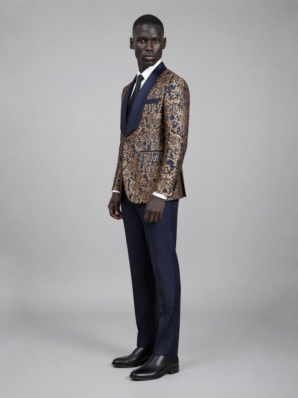 Savile GA0170 Men's Navy Blue Gold Paisley Jacquard Tuxedo – Back View Showing Full Gold Paisley Jacquard Coverage & Navy Trousers