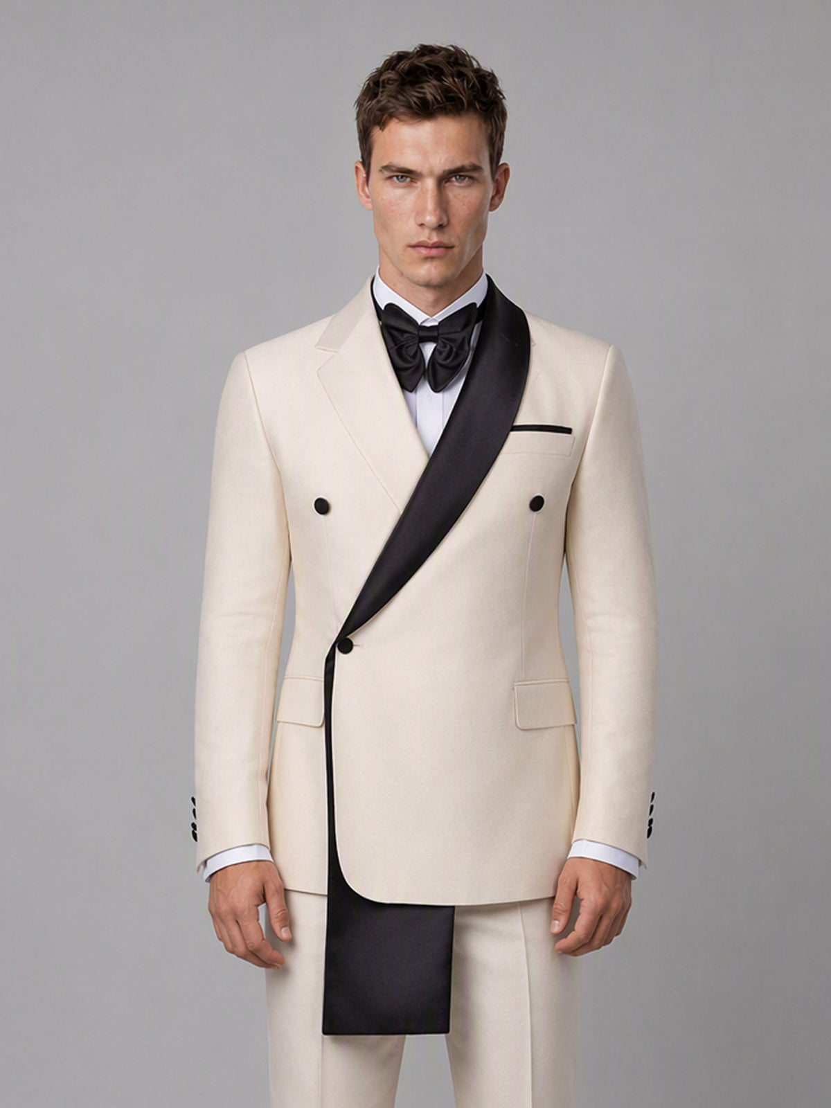 Savile GA0172 Men's Beige Double-Breasted Black Satin Shawl Lapel Tuxedo – Front 3/4 View Adjusting Bow Tie with Black Oxford Shoes