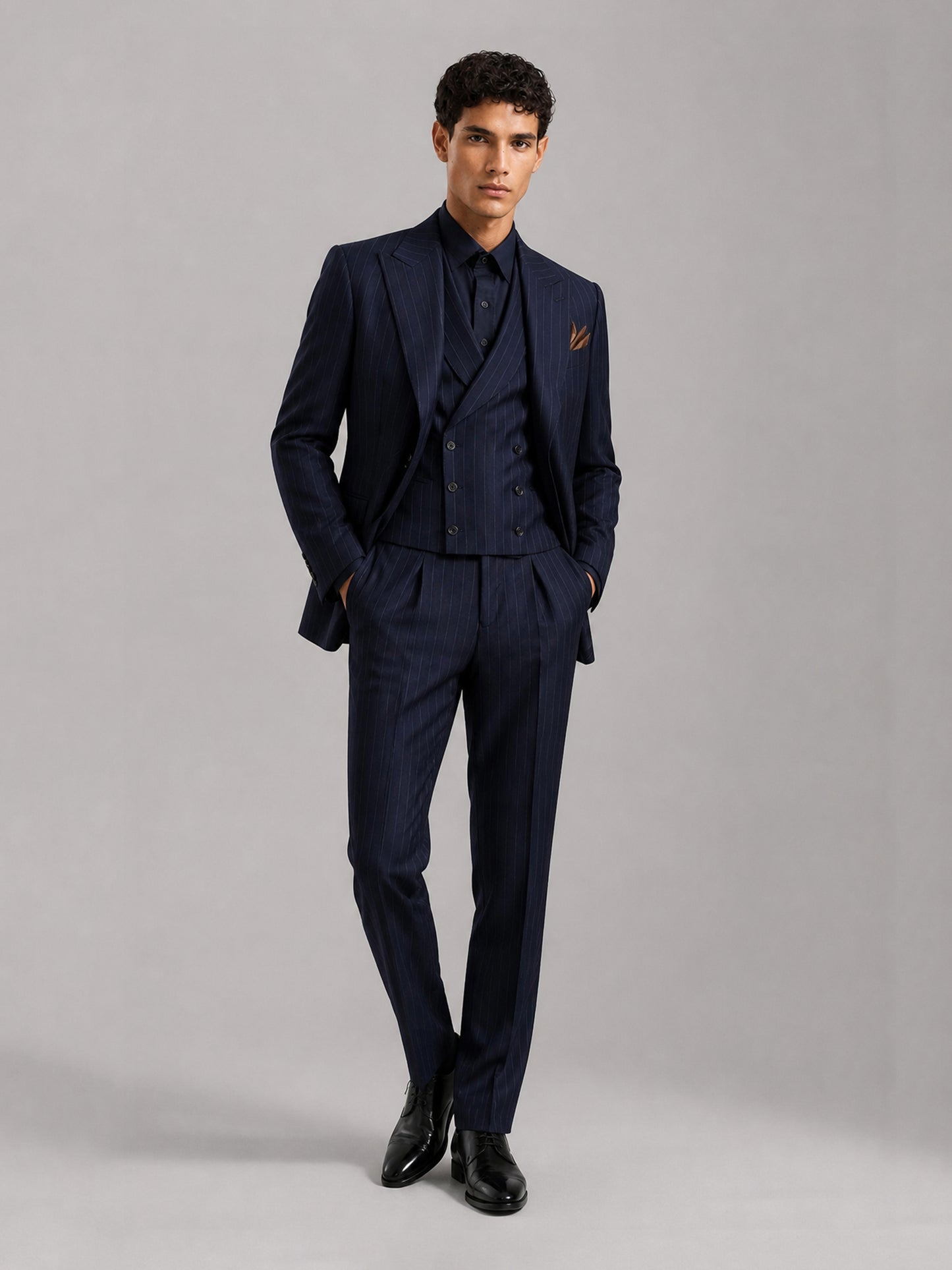Men's navy blue pinstripe 3-piece suit set – front full-length hands-in-pockets view, Savile GA0174