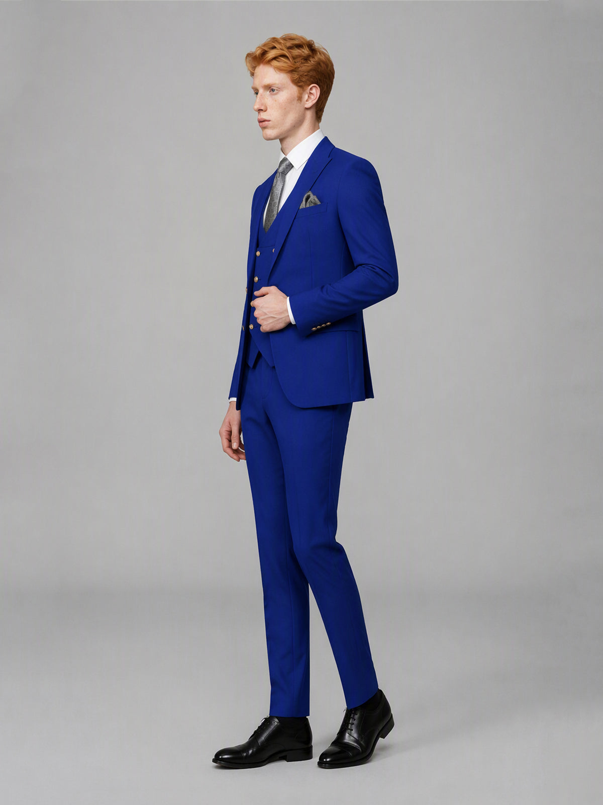 Men's royal blue 3-piece suit set – three-quarter side standing view, Savile GA0177