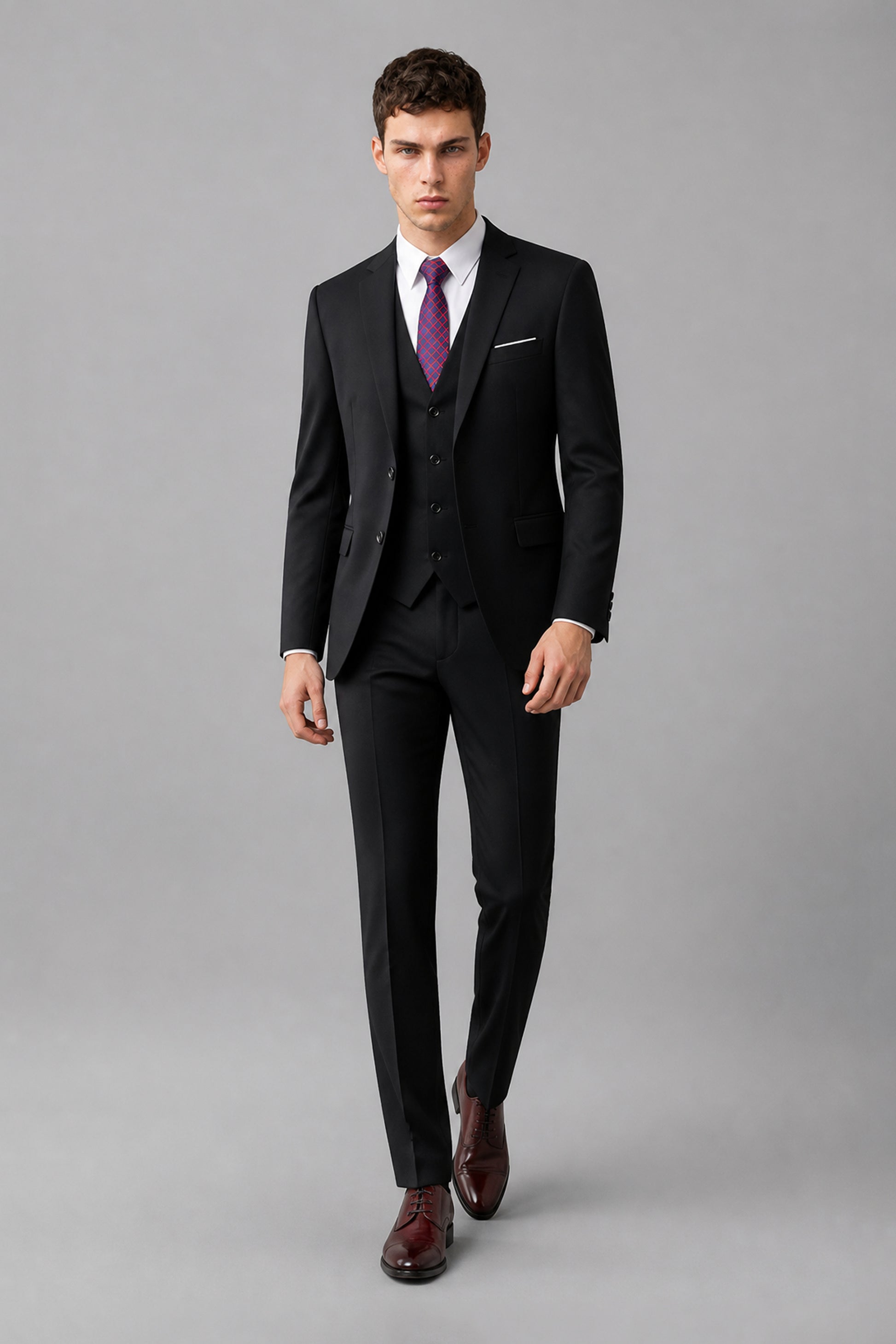 Savile Black 3-Piece Suit Set – Rear three-quarter view showing jacket back construction and tapered trouser fit