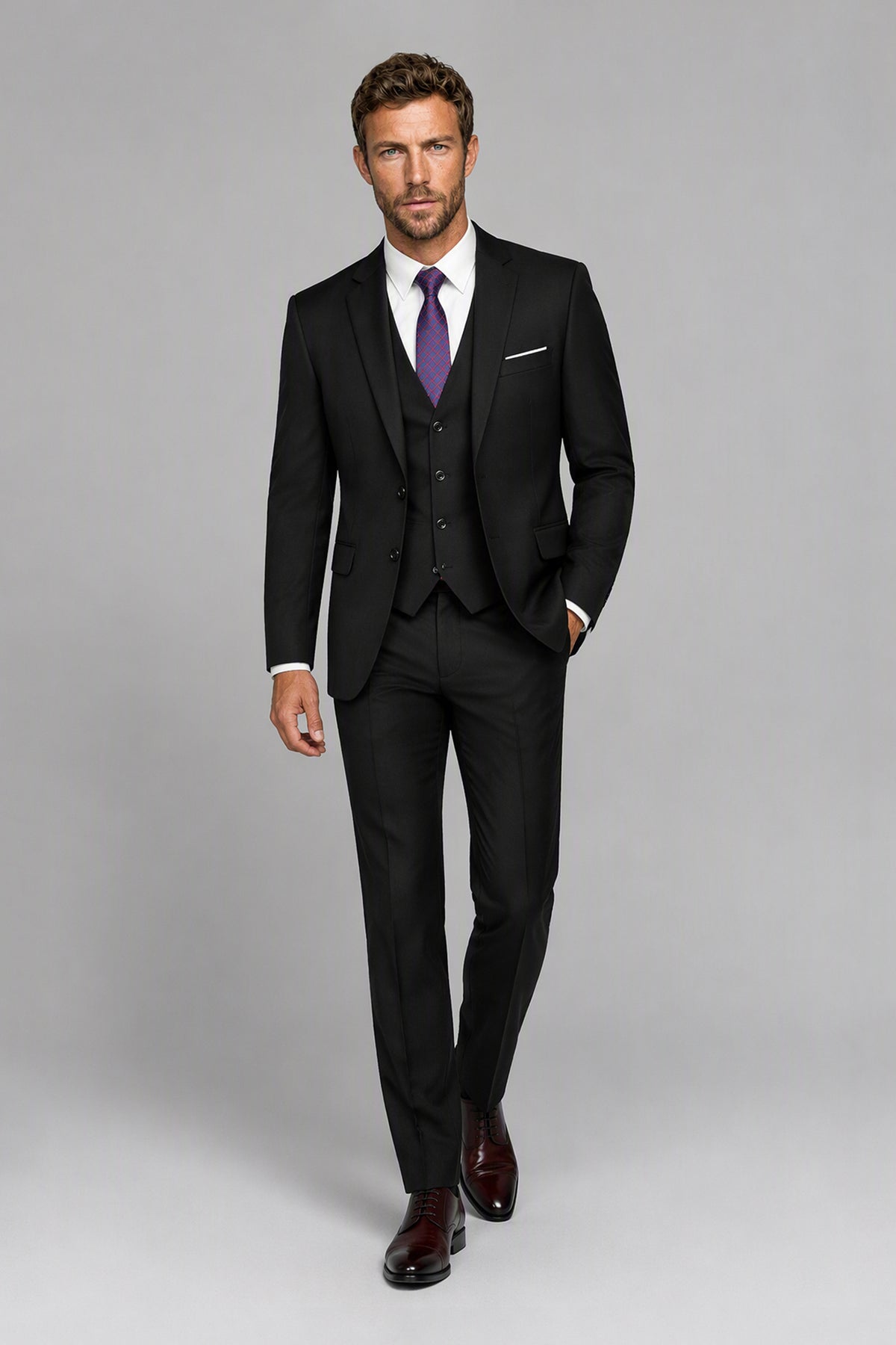 Savile Black 3-Piece Suit Set – Three-quarter side view, second model adjusting jacket showing lapel and fit detail