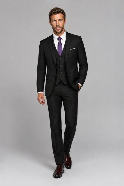Savile Black 3-Piece Suit Set – Three-quarter side view, second model adjusting jacket showing lapel and fit detail