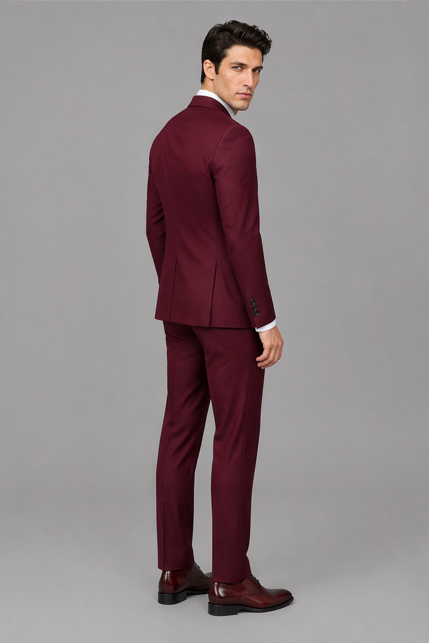 Savile Burgundy 3-Piece Suit Set – Full front standing view, hands clasped showing slim-fit silhouette and trouser break