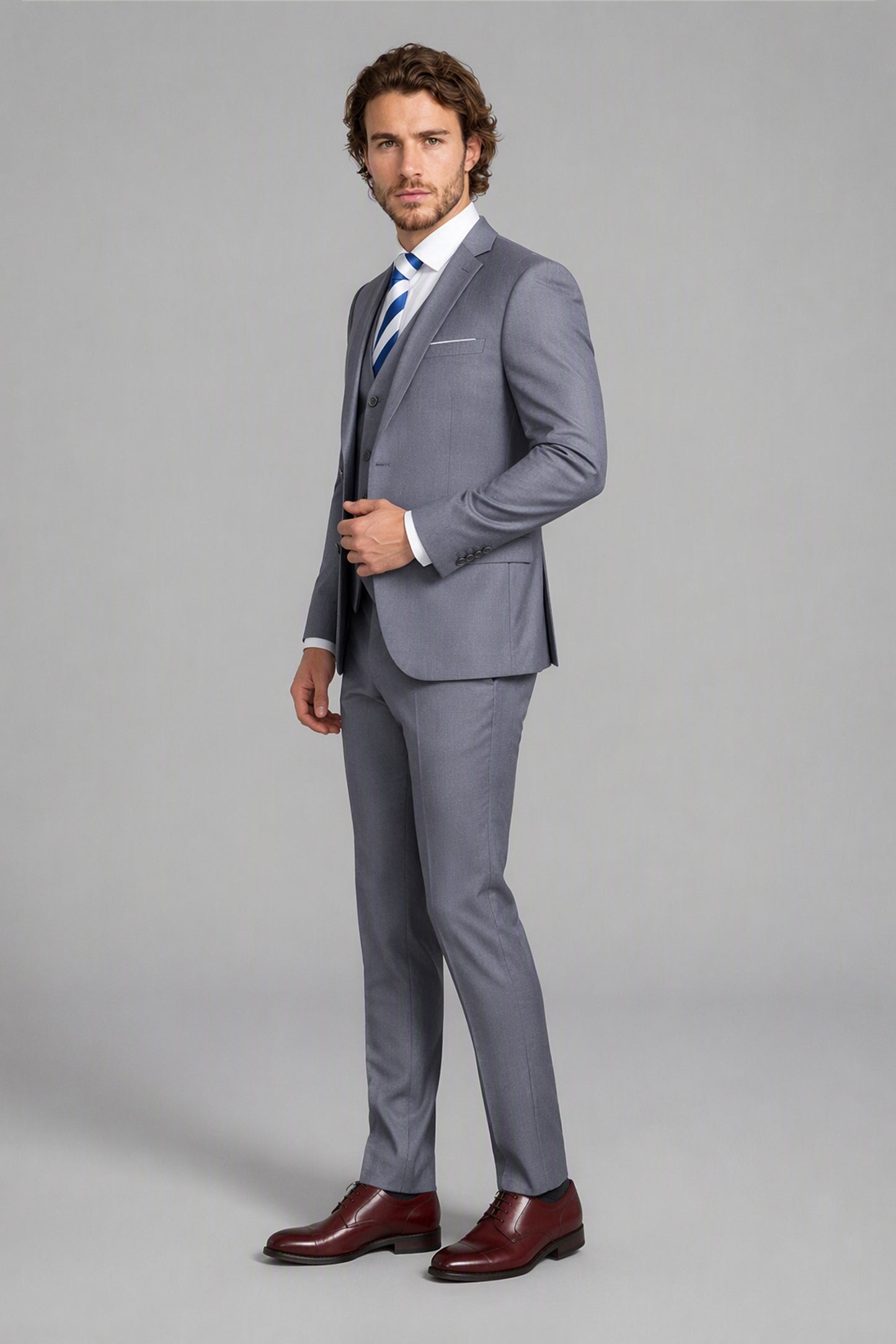 Savile Light Gray 3-Piece Suit Set – Half-body front close-up showing notch lapel jacket, vest buttons, pocket square and blue striped tie