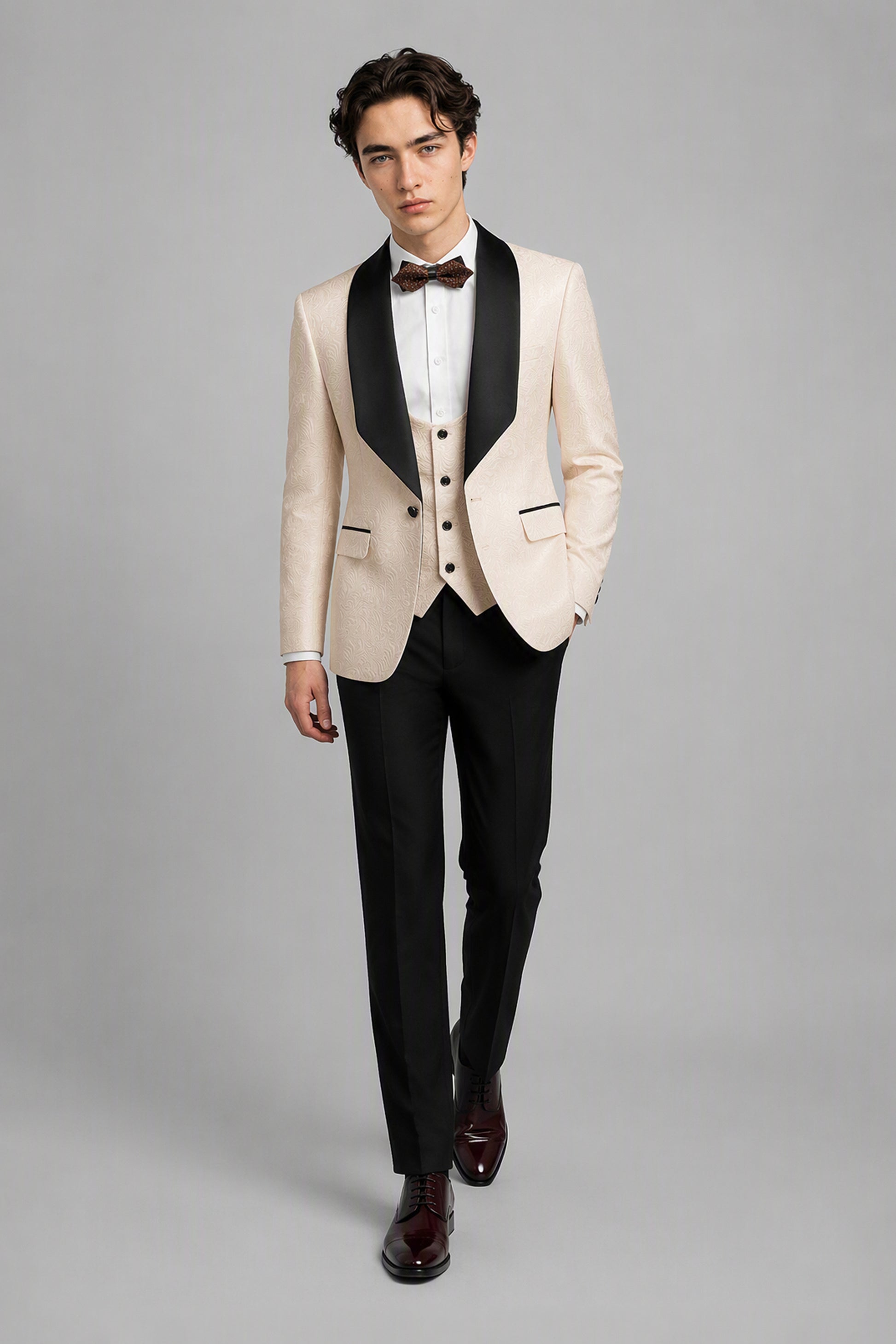Savile Champagne Jacquard 3-Piece Tuxedo Set – Half-body front close-up showing floral jacquard texture, black satin shawl lapel, champagne vest and brown bow tie