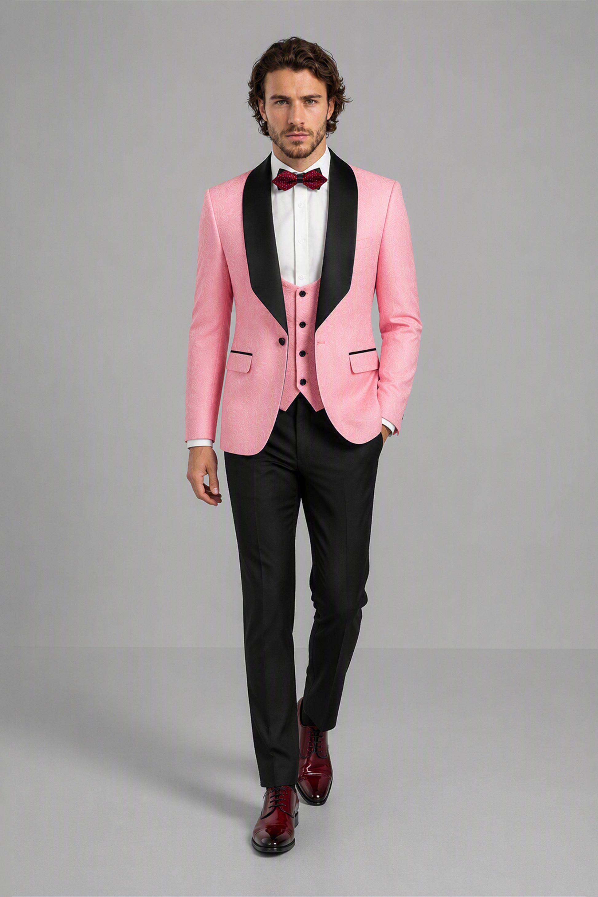 Savile Pink Jacquard 3-Piece Tuxedo Set – Full front close-up showing blush pink floral jacquard texture, black satin shawl lapel, pink vest and red bow tie