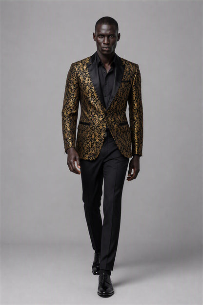 Savile Black & Gold Jacquard Tuxedo Jacket – Full front standing view, hands clasped showing slim-fit silhouette with black shirt and black trousers