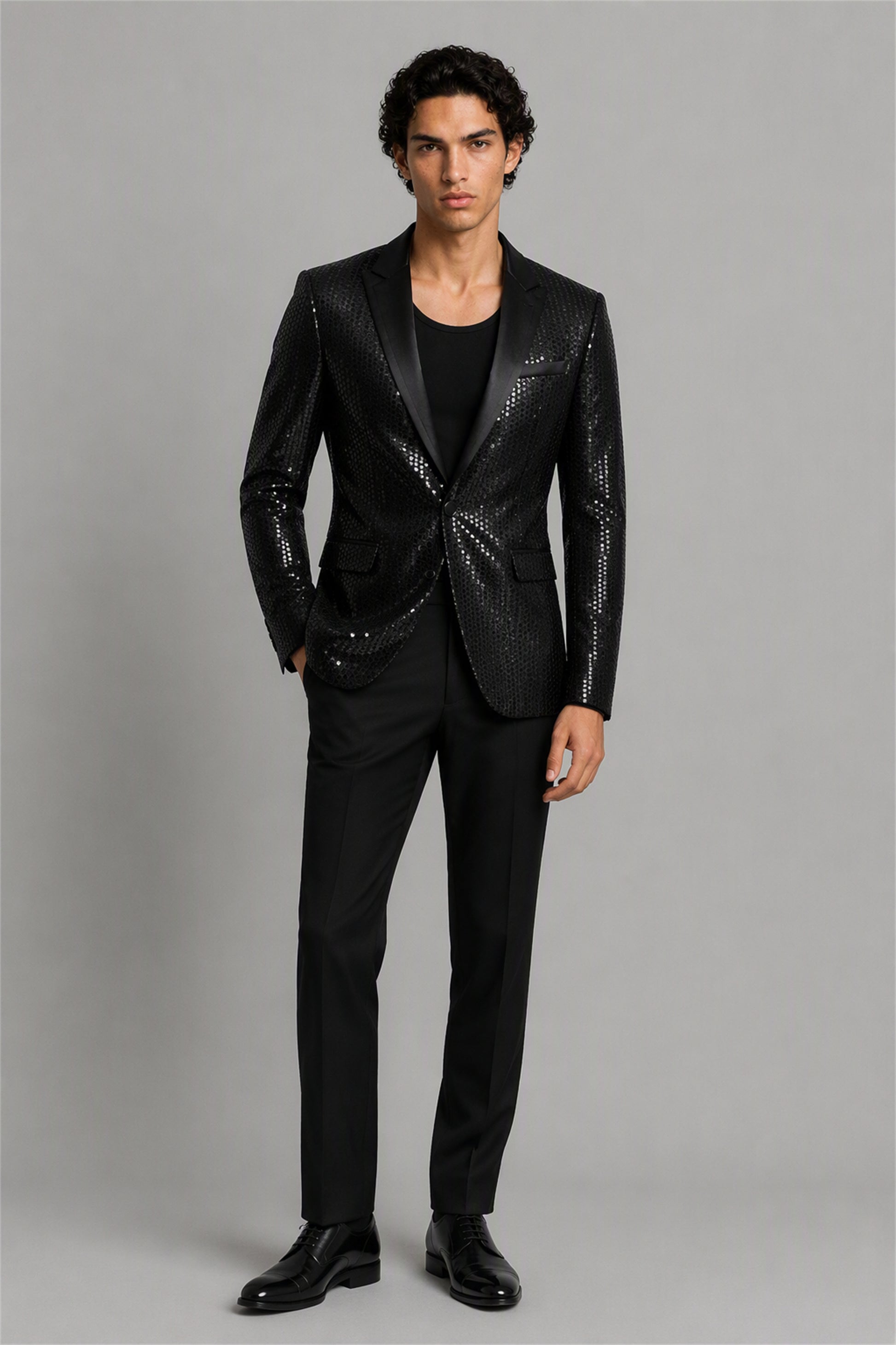 Savile Black Sequin Tuxedo Jacket – Rear three-quarter view showing sequin jacket back construction and black satin lapel edge